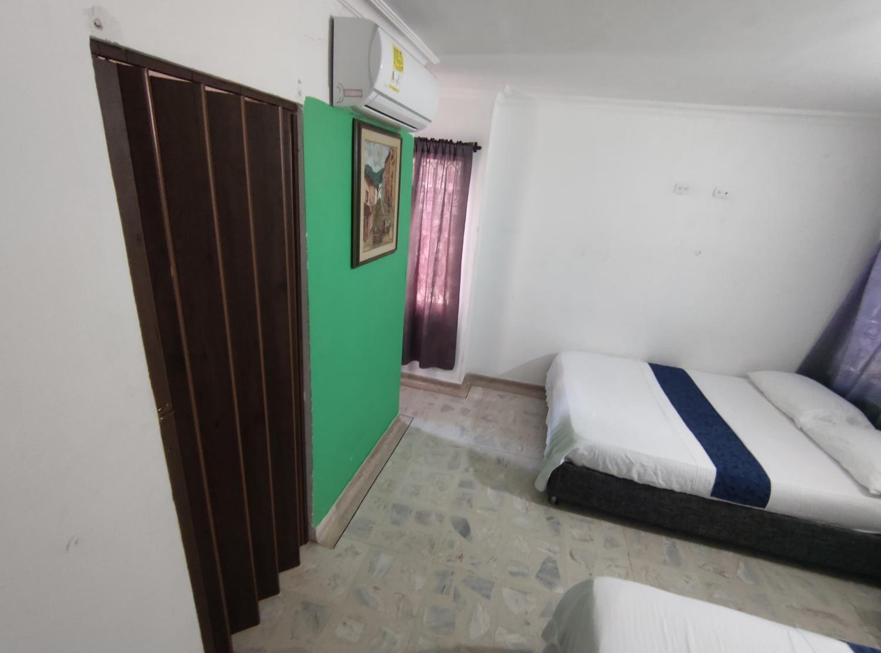 Quadruple Room with Private Bathroom