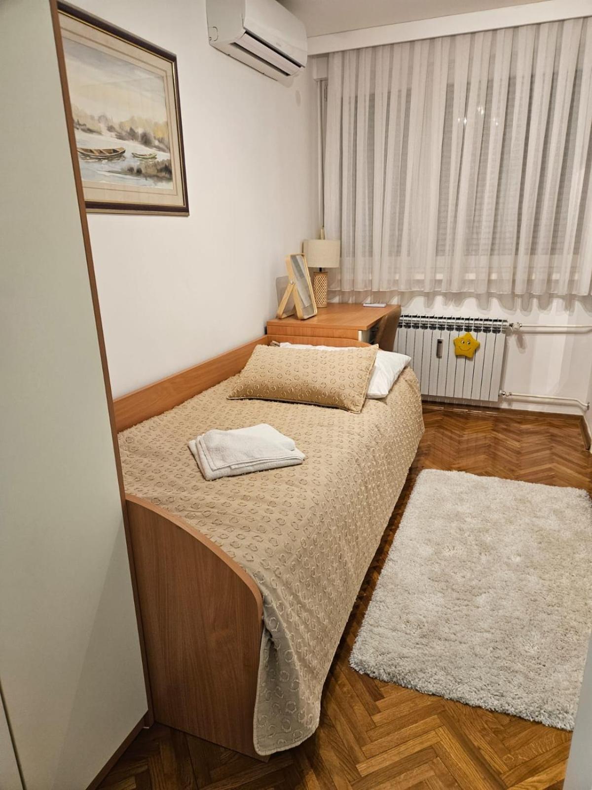 Three-Bedroom Apartment photo 2