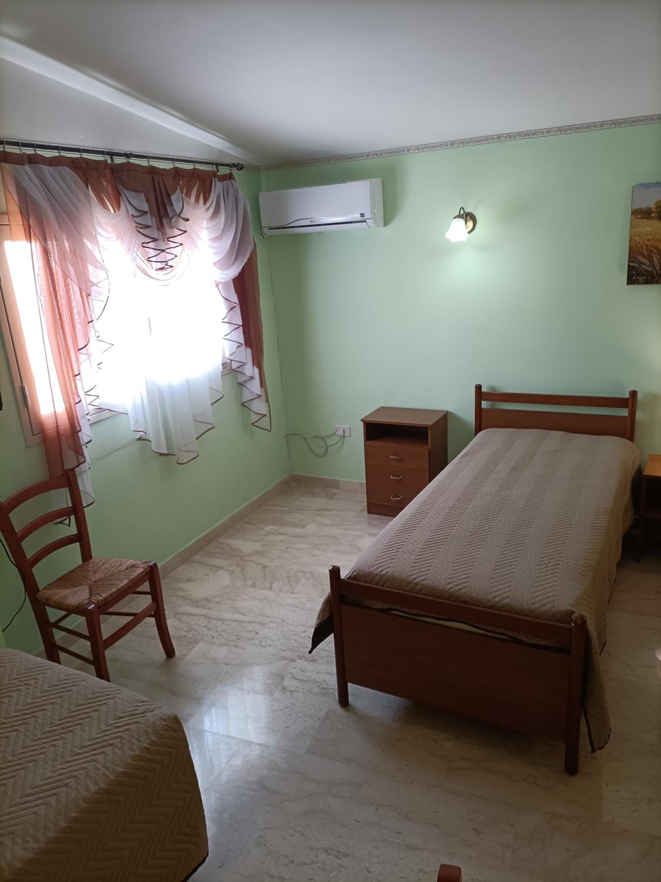 Quadruple Room With Private Bathroom photo 3