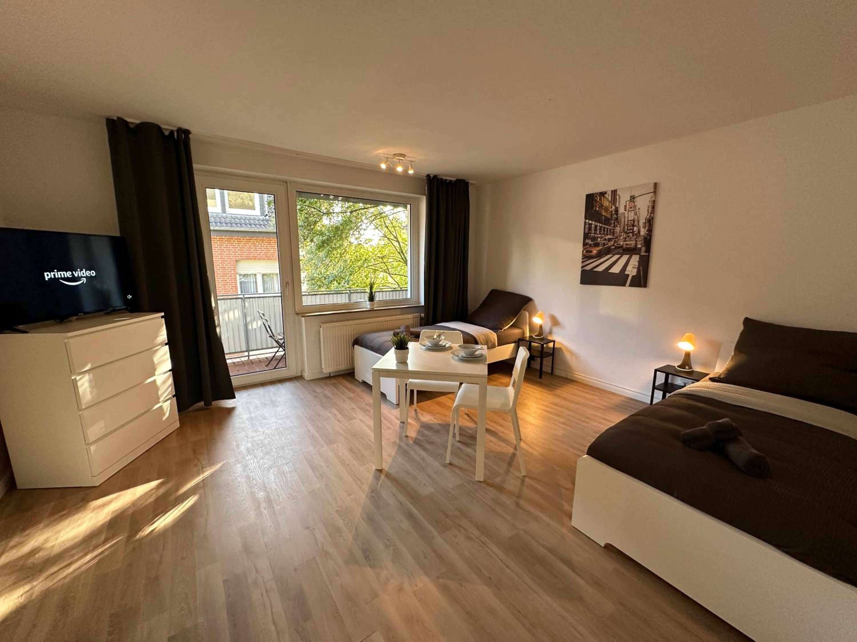 Three-Bedroom Apartment photo 1