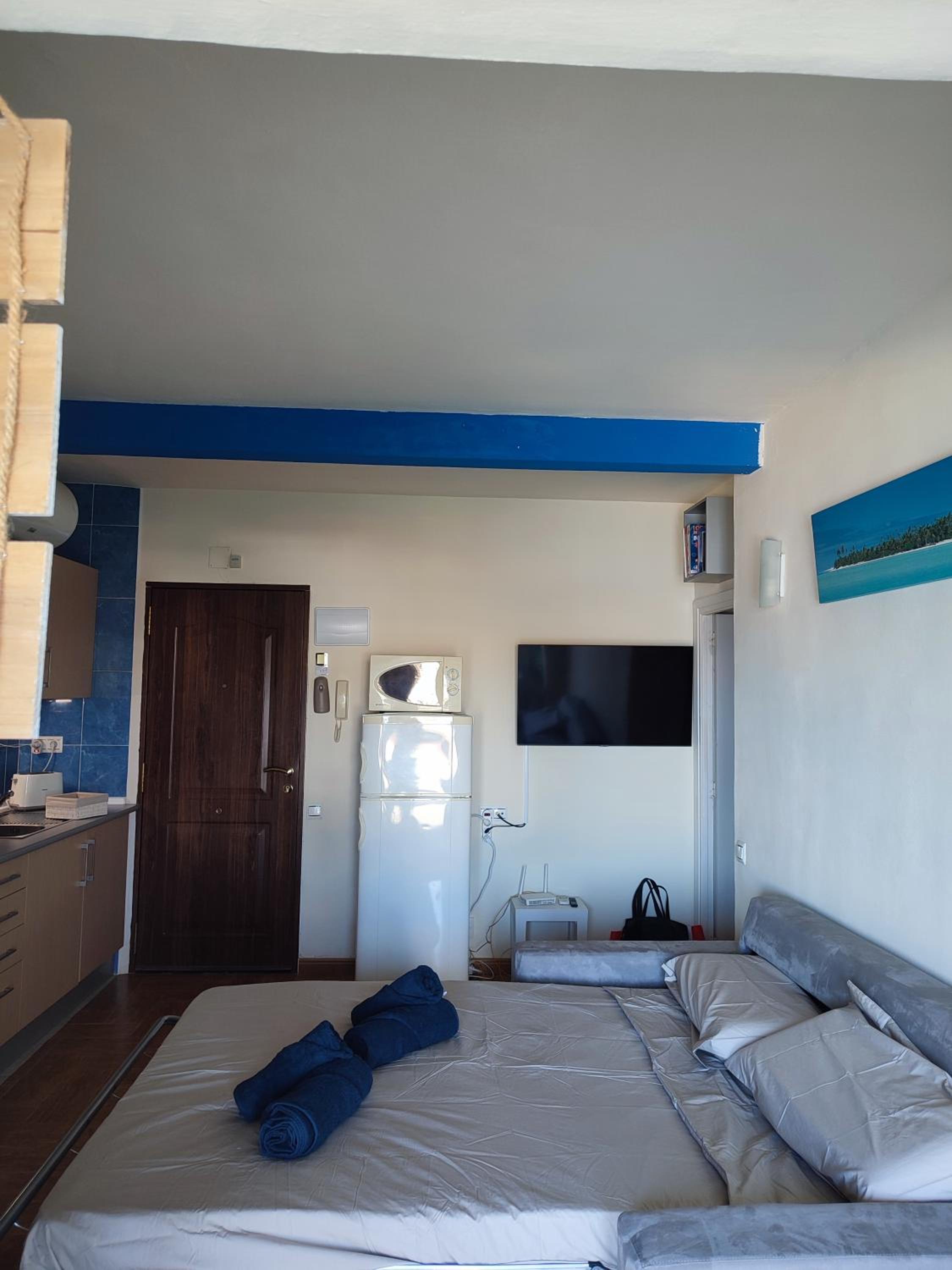 Estudio con sofá cama