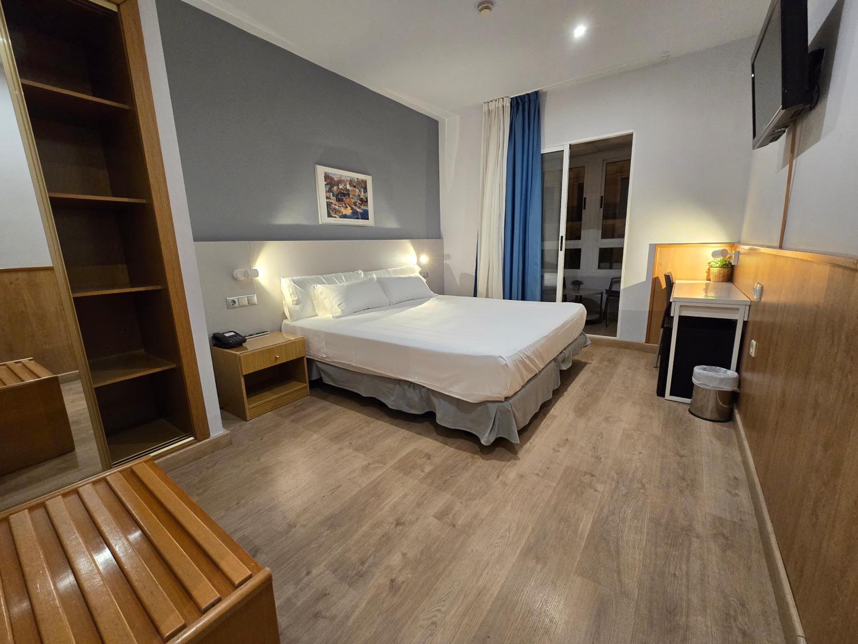 Habitación King con Balcón