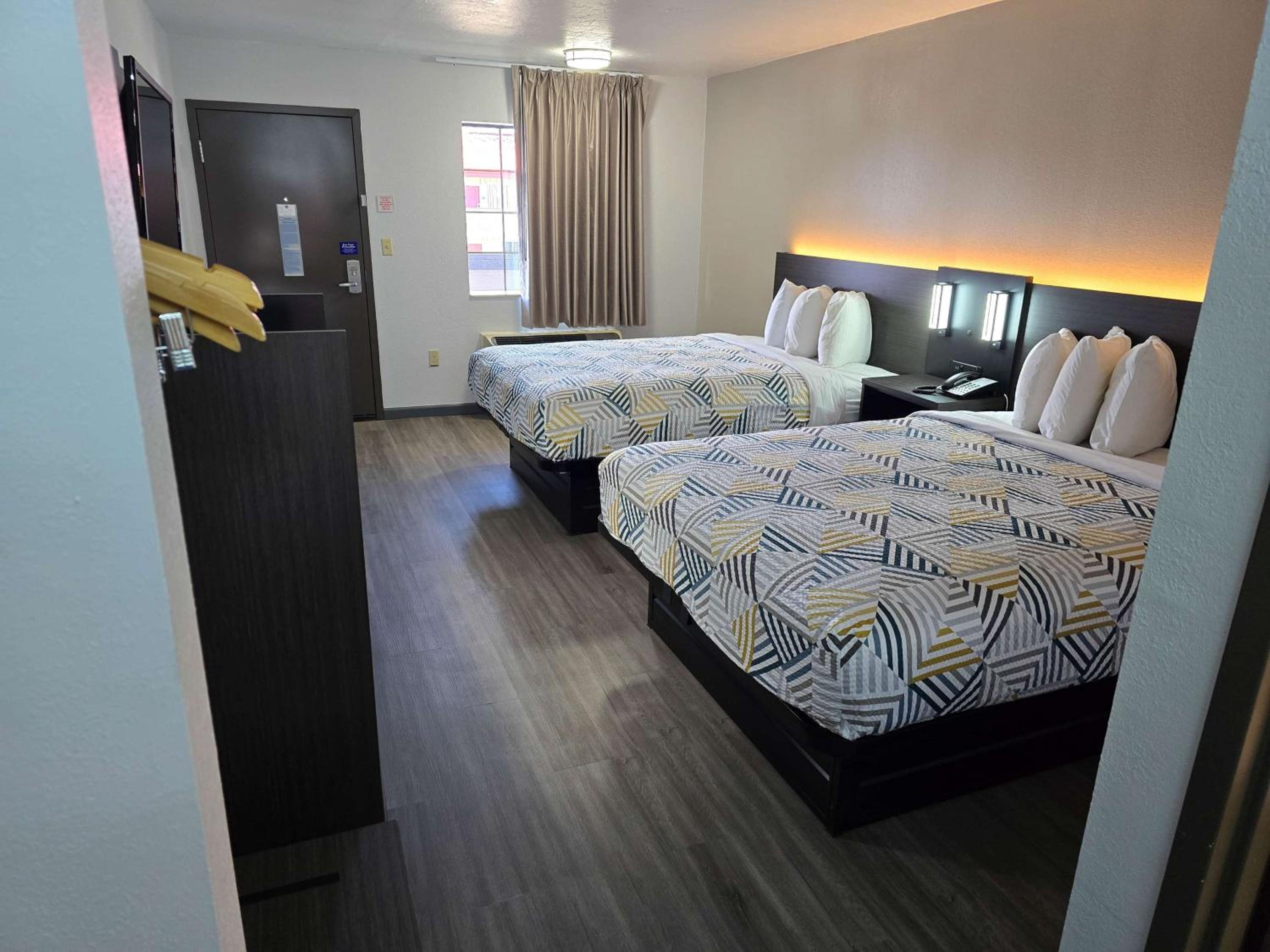 Queen Room with Two Queen Beds - Smoking - Photo 1