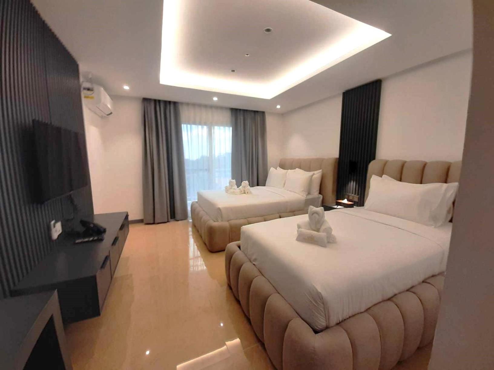 Deluxe Twin Room - Photo 11