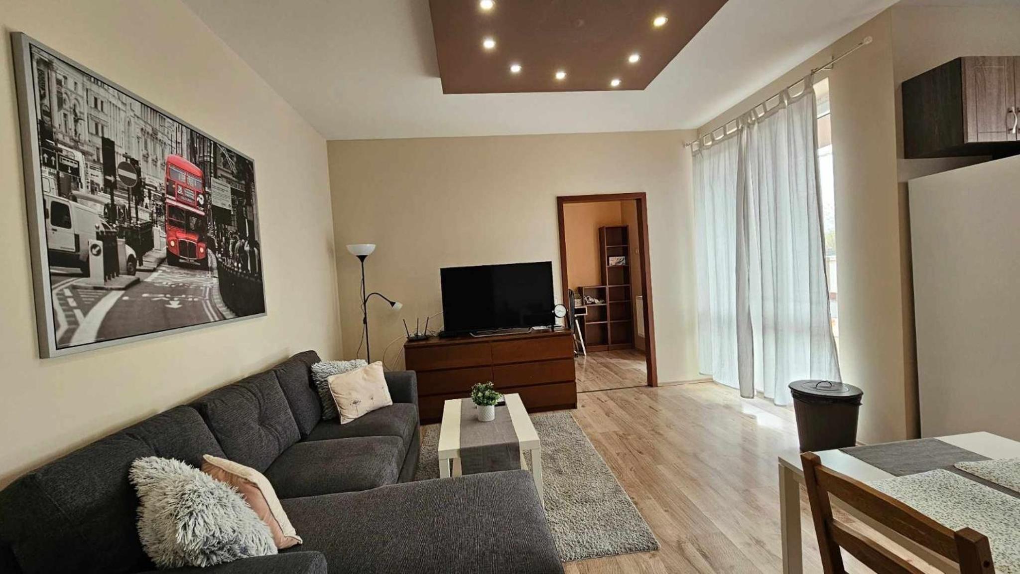 Three-Bedroom Apartment photo 2