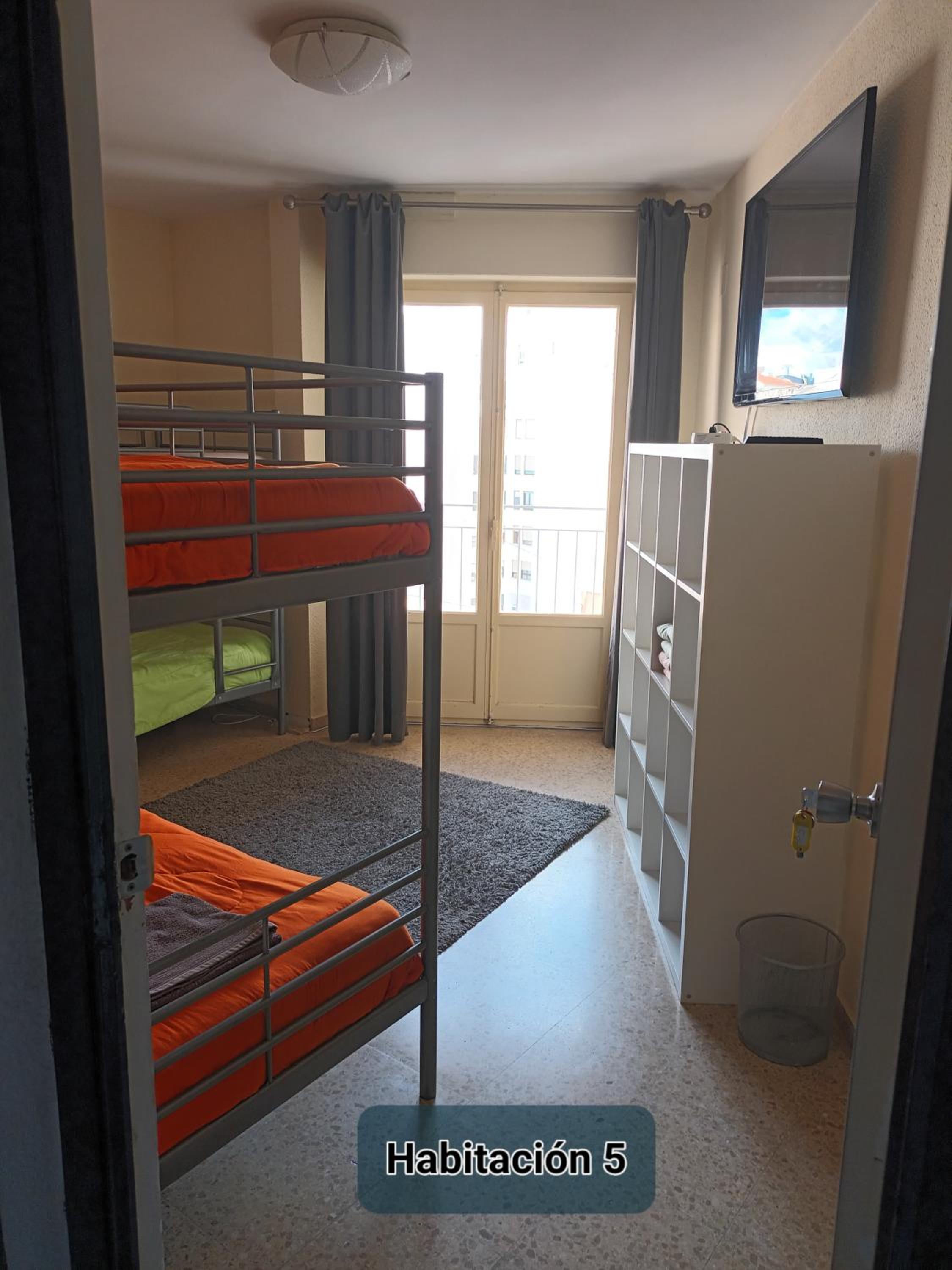 Habitación Cuádruple con Baño Compartido