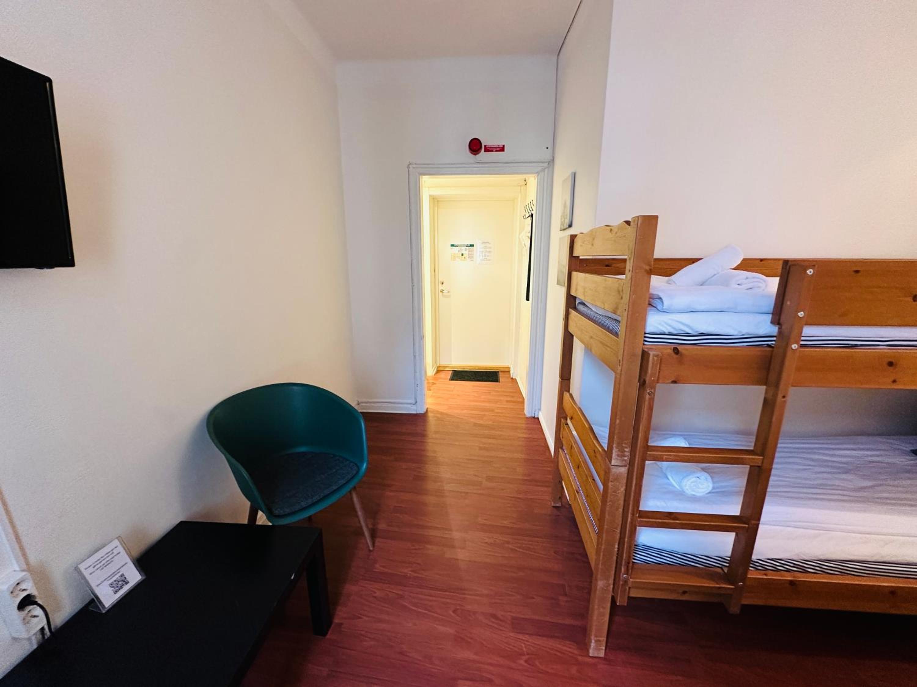 Single Bed In Male Dormitory Room photo 1