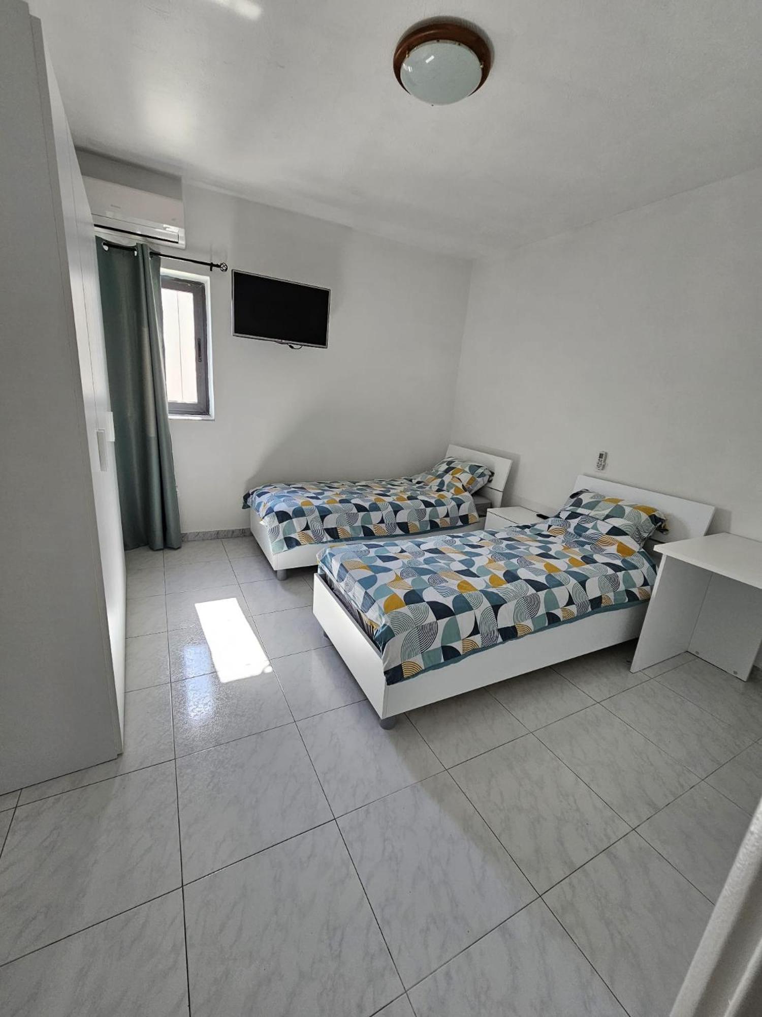 Two-Bedroom Apartment with Balcony and Sea View