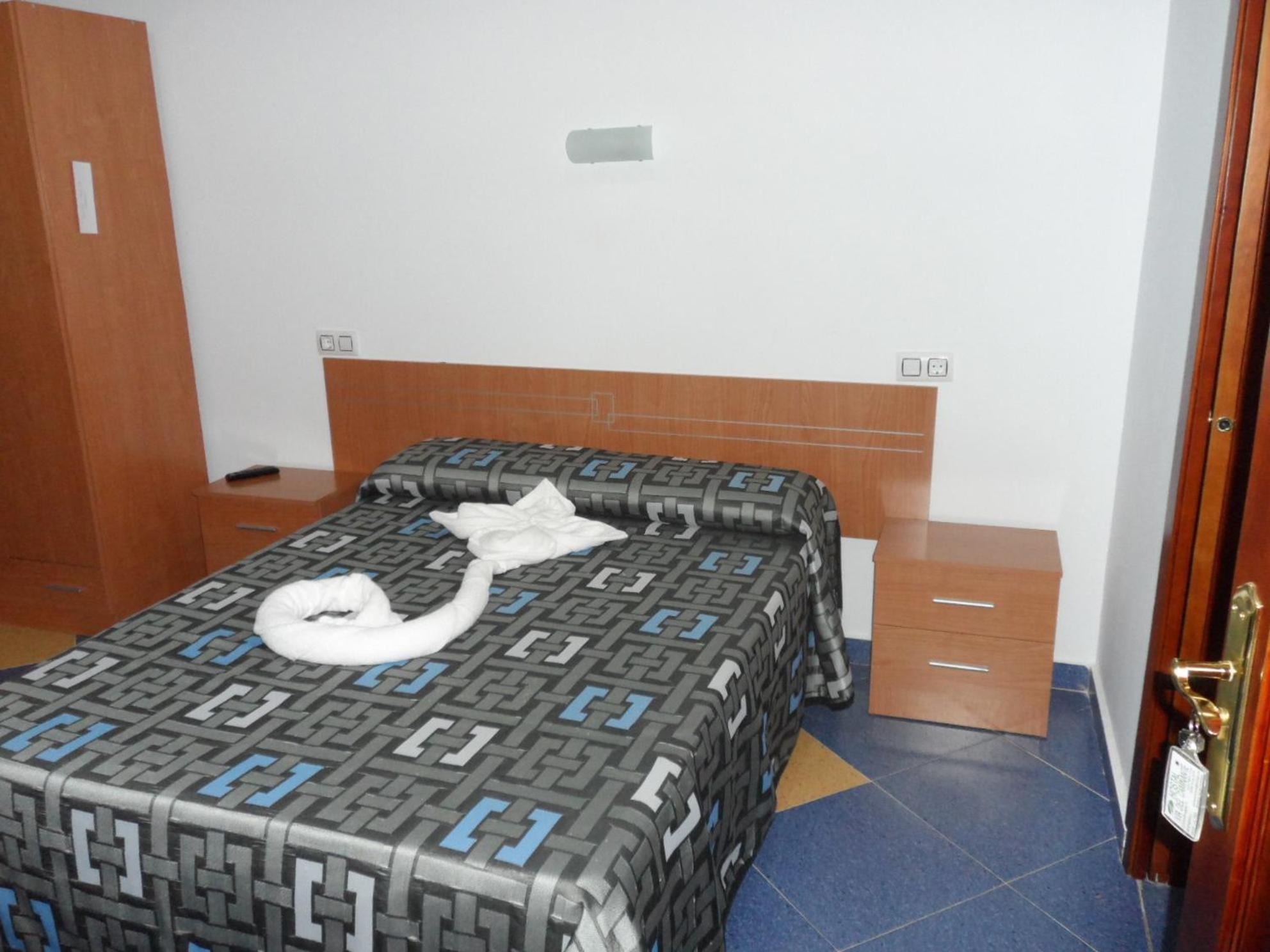 Habitación Estándar con Cama Queen