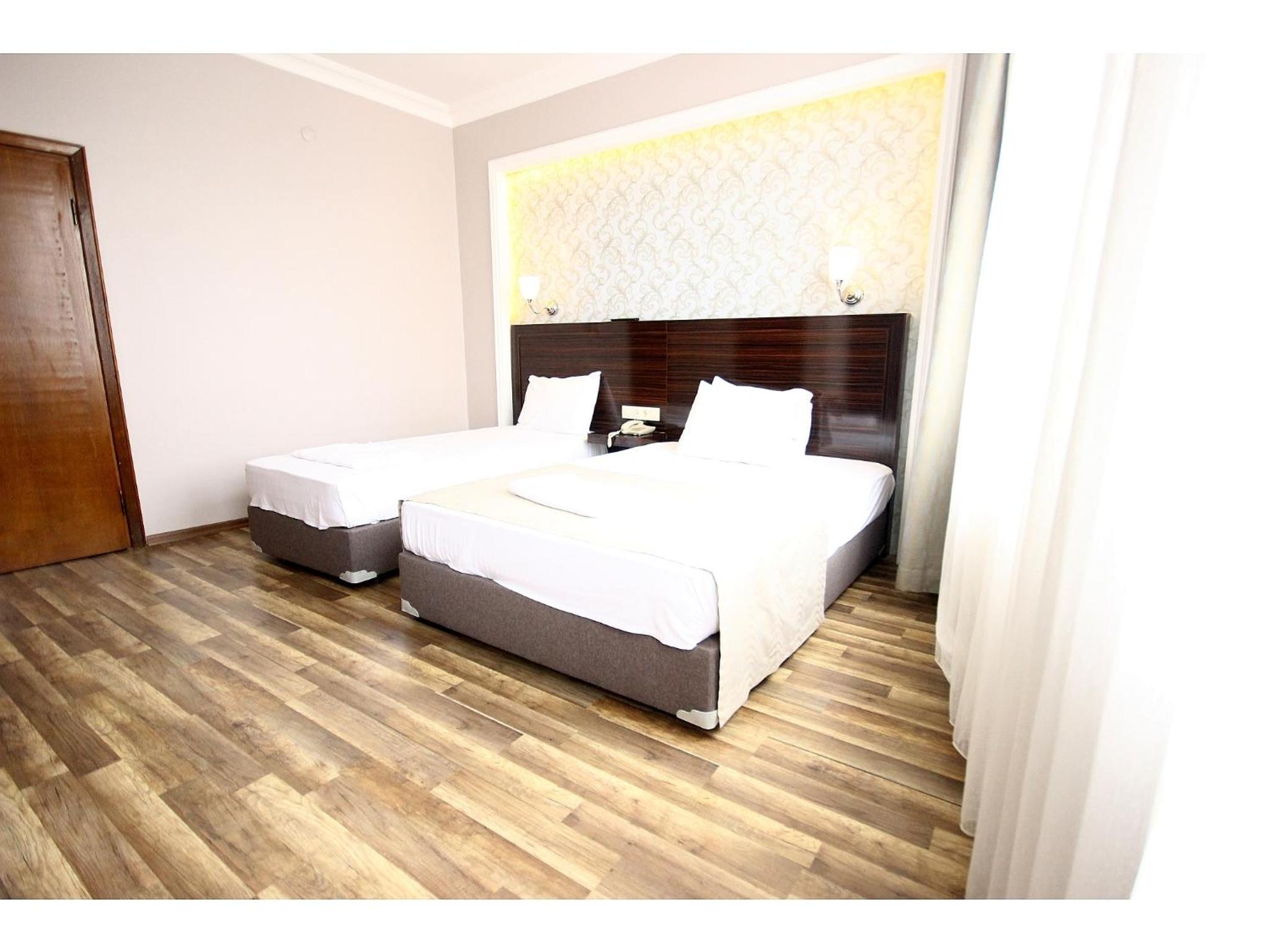 Economy Triple Room photo 1
