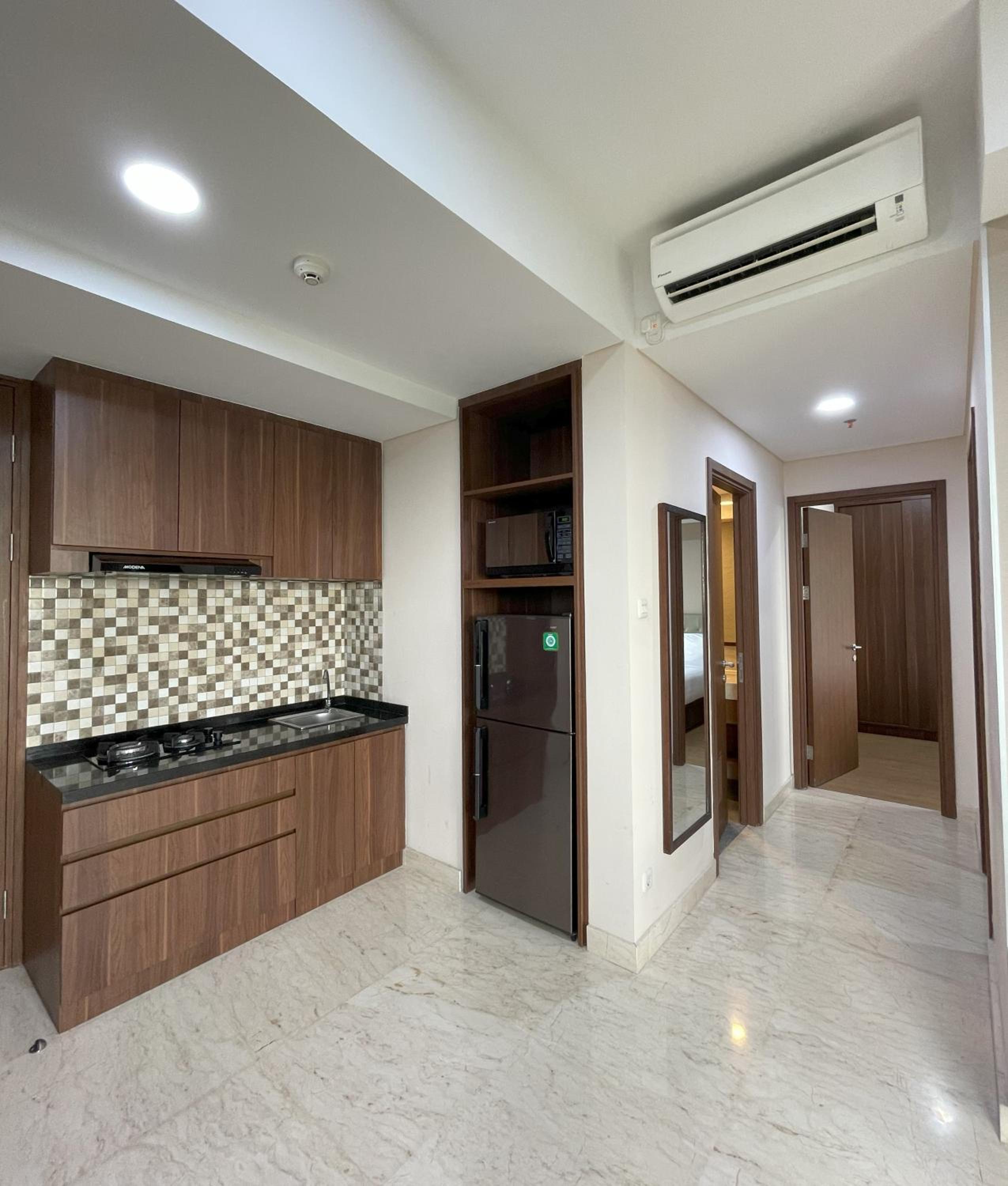 Two-Bedroom Apartment - Photo 34
