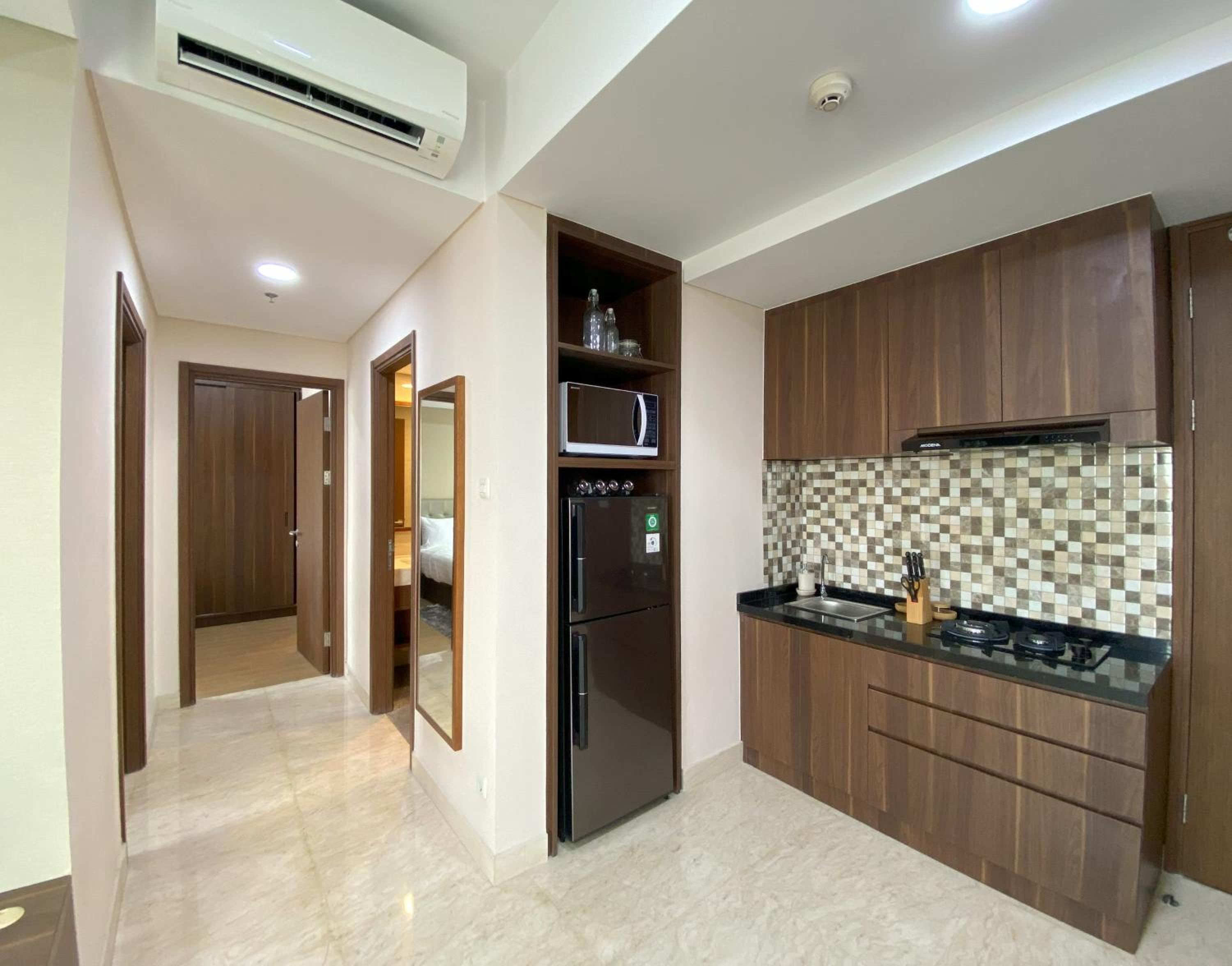 Two-Bedroom Apartment - Photo 35