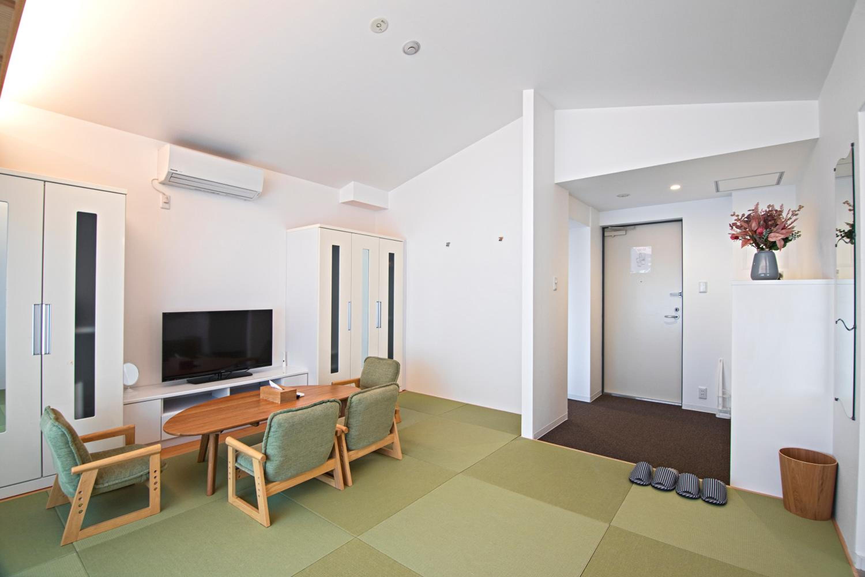 Quadruple Room - Photo 11