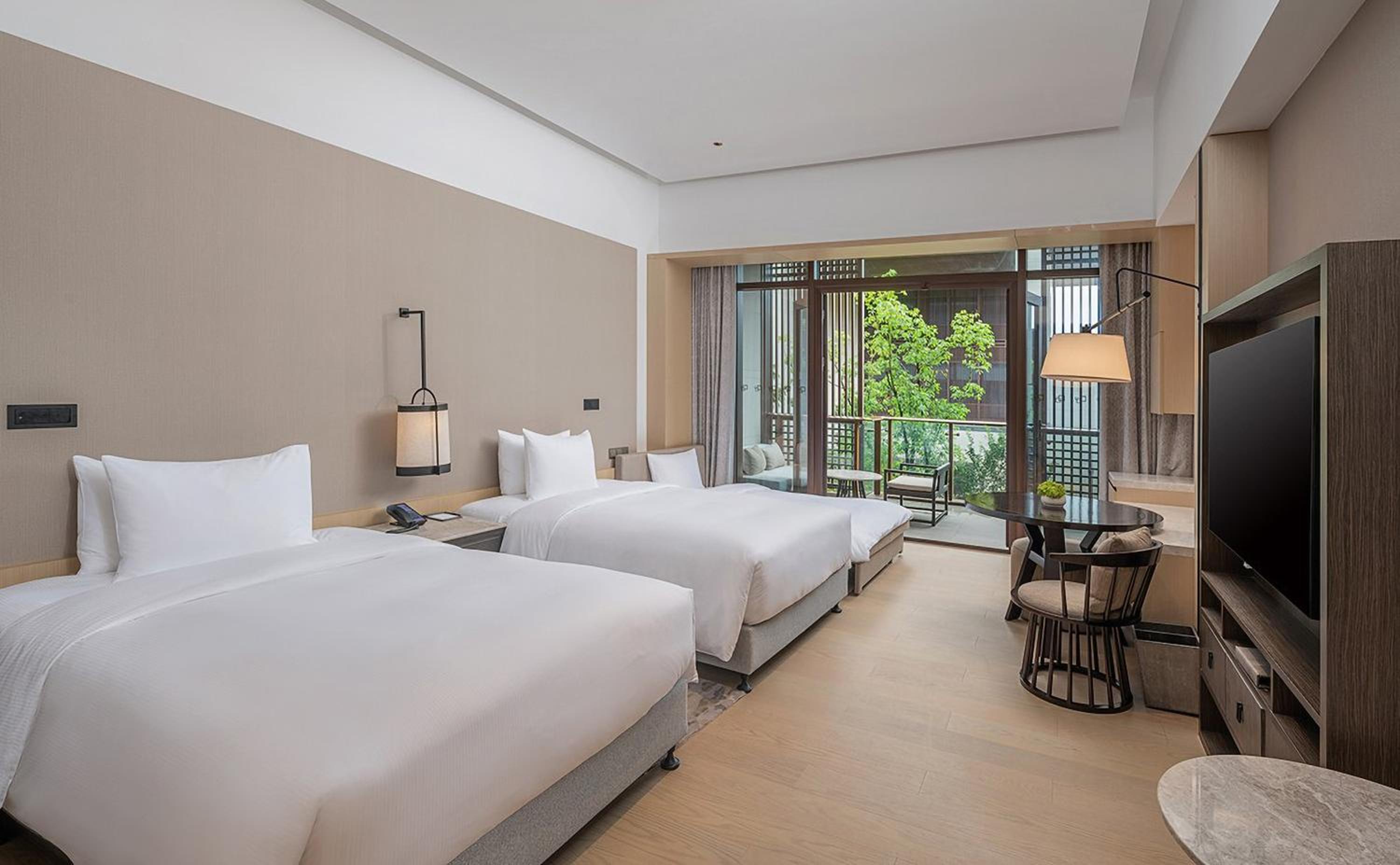 Deluxe Family Twin Room with Garden View - Photo 1