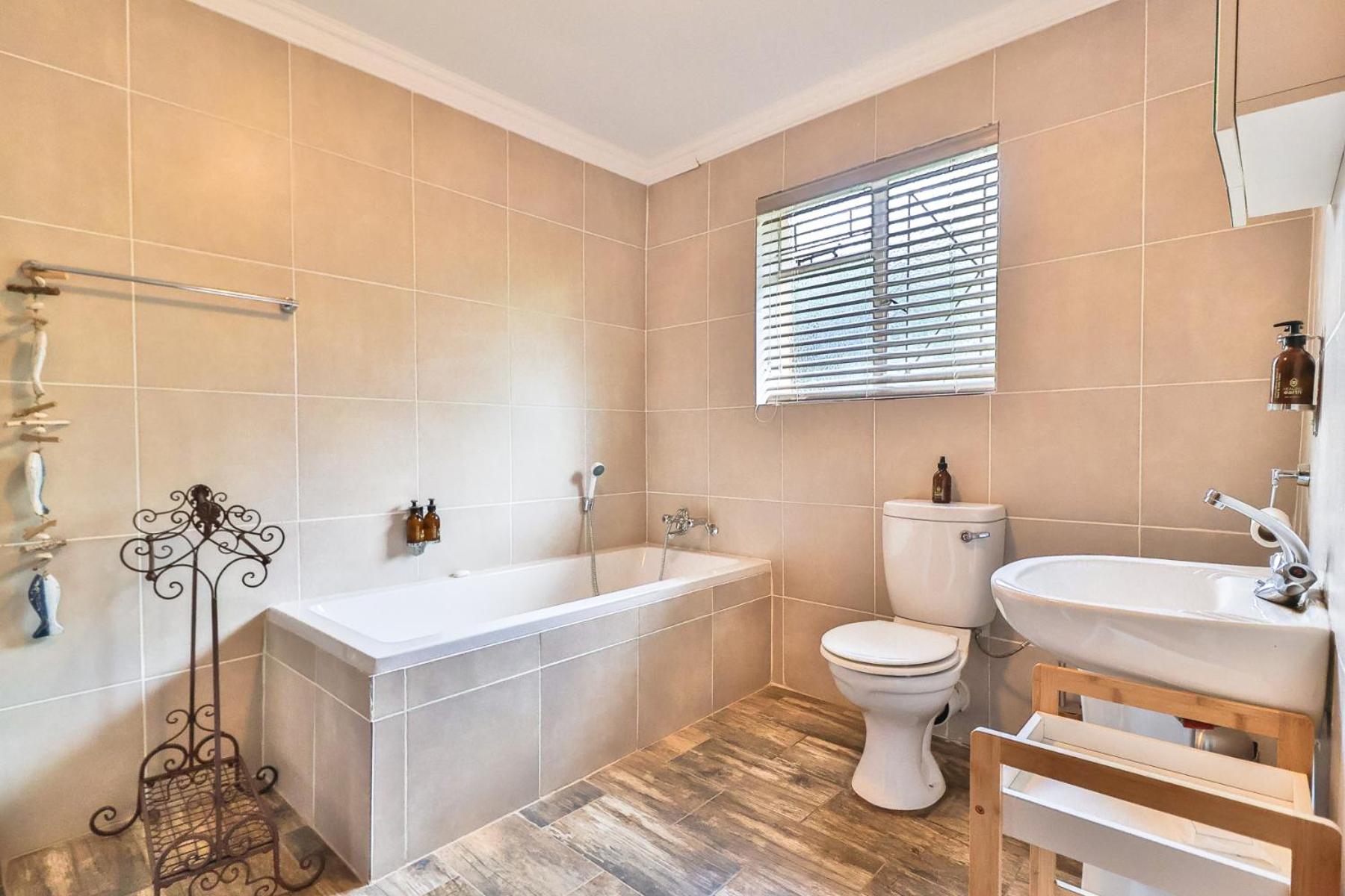 Three-Bedroom House -(pet friendly) - Photo 16