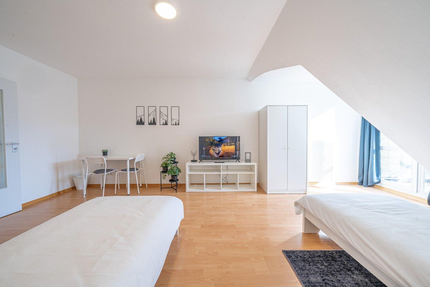 Three-Bedroom Apartment photo 2