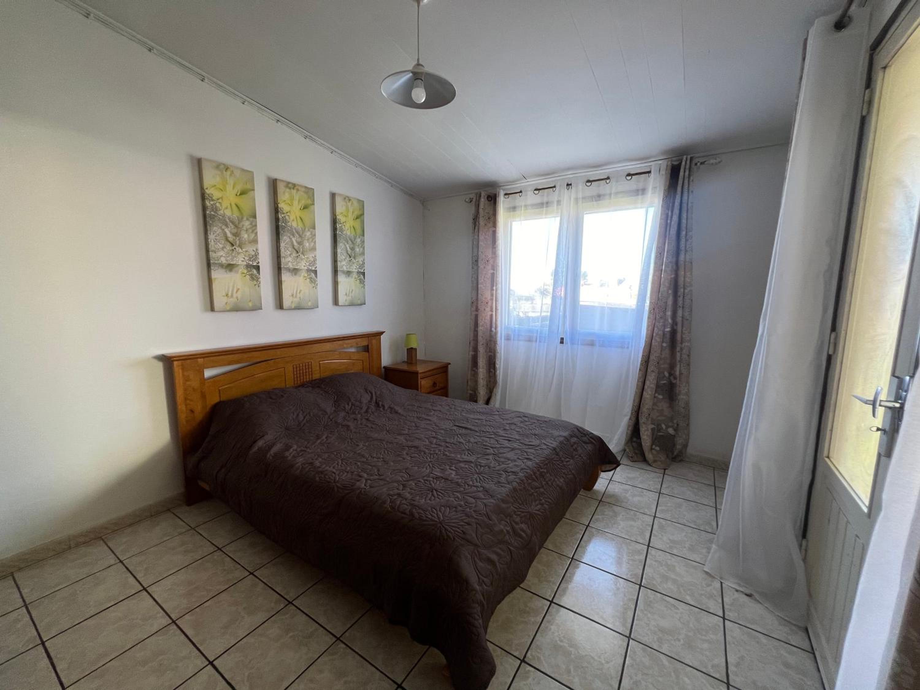 Three-Bedroom House photo 1