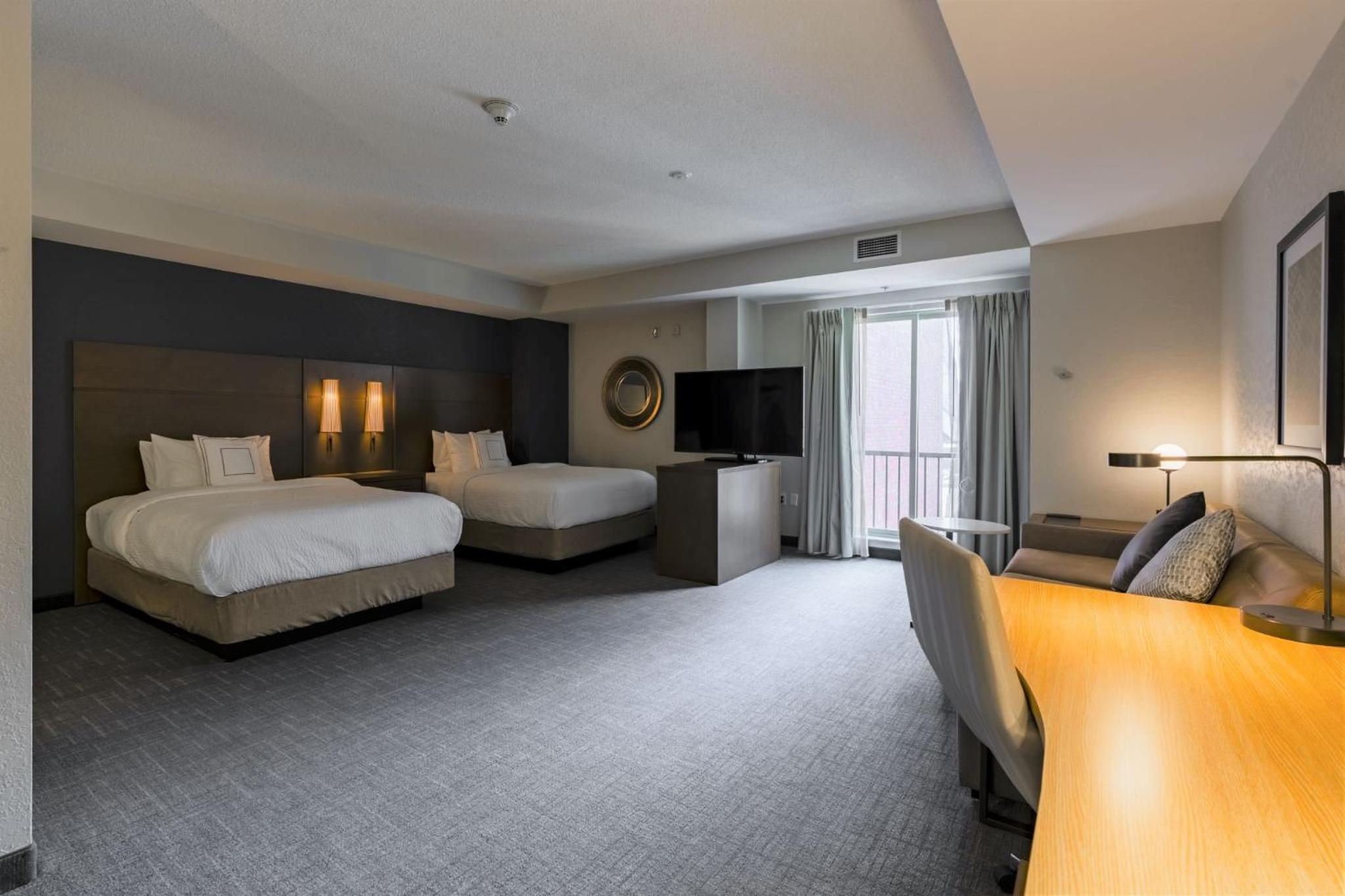 Studio Room with Two Double Beds and Sofa Bed