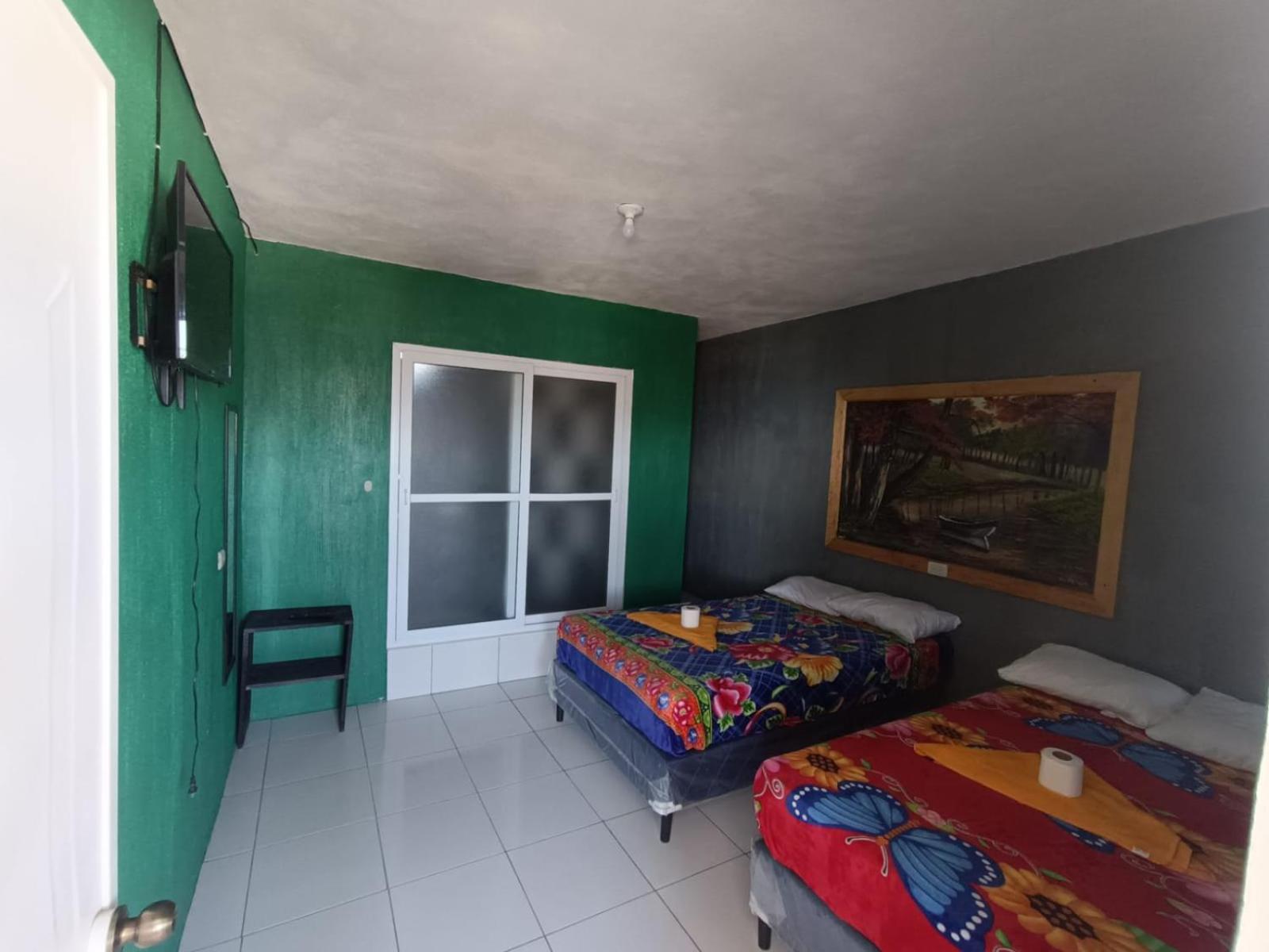 Deluxe Queen Room With Two Queen Beds photo 2