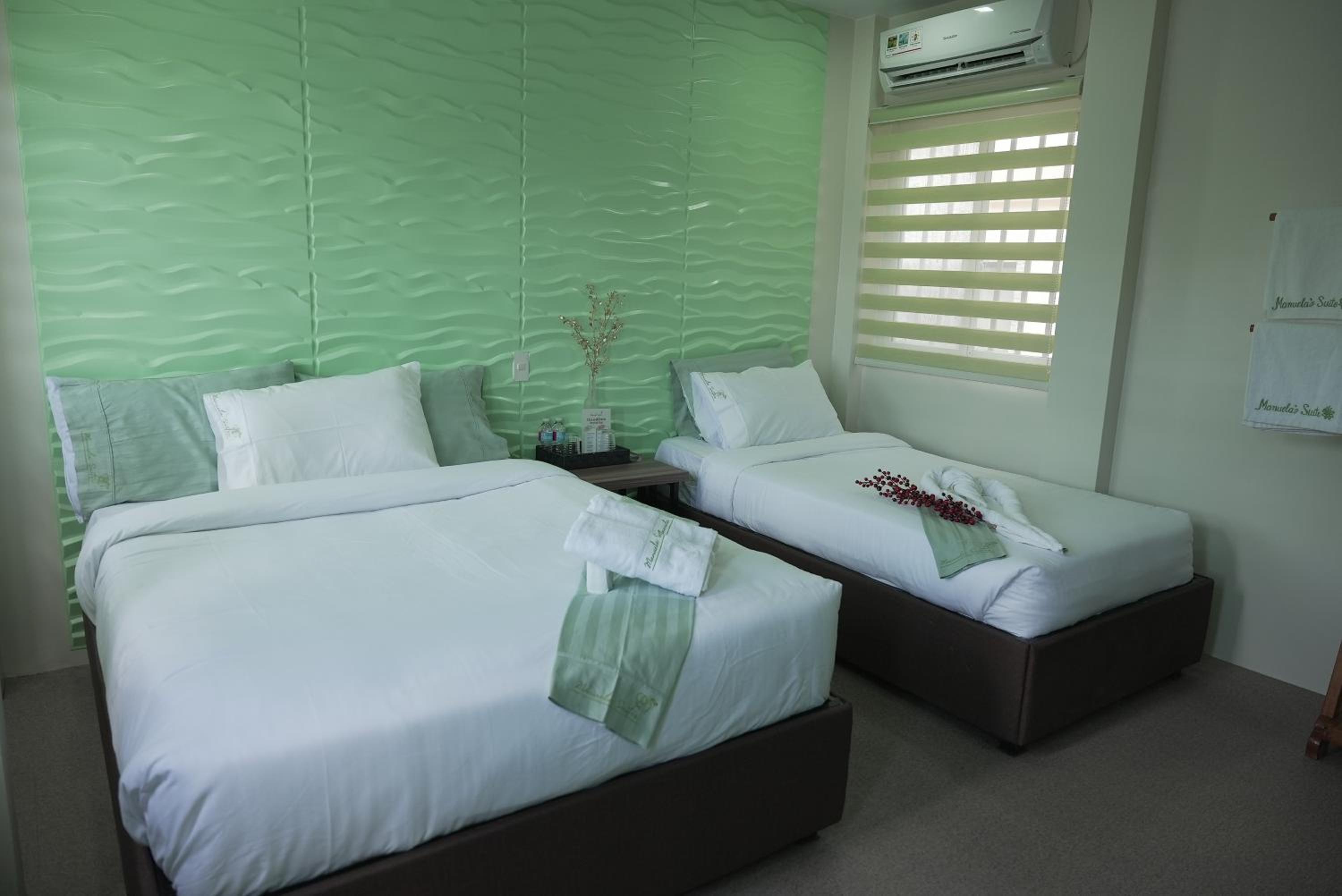 Deluxe Triple Room - Photo 18