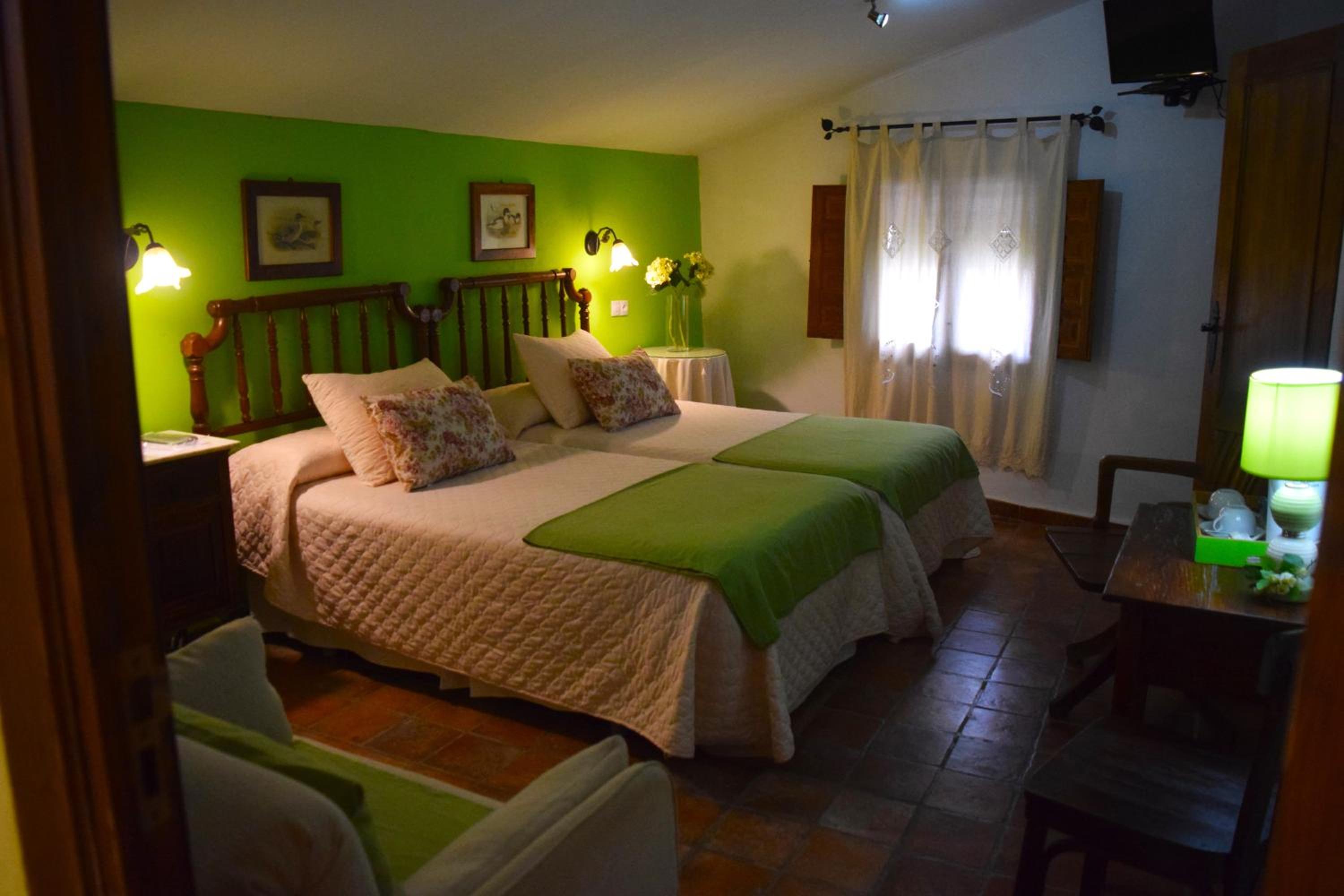 Habitación Deluxe Queen con Dos Camas Queen