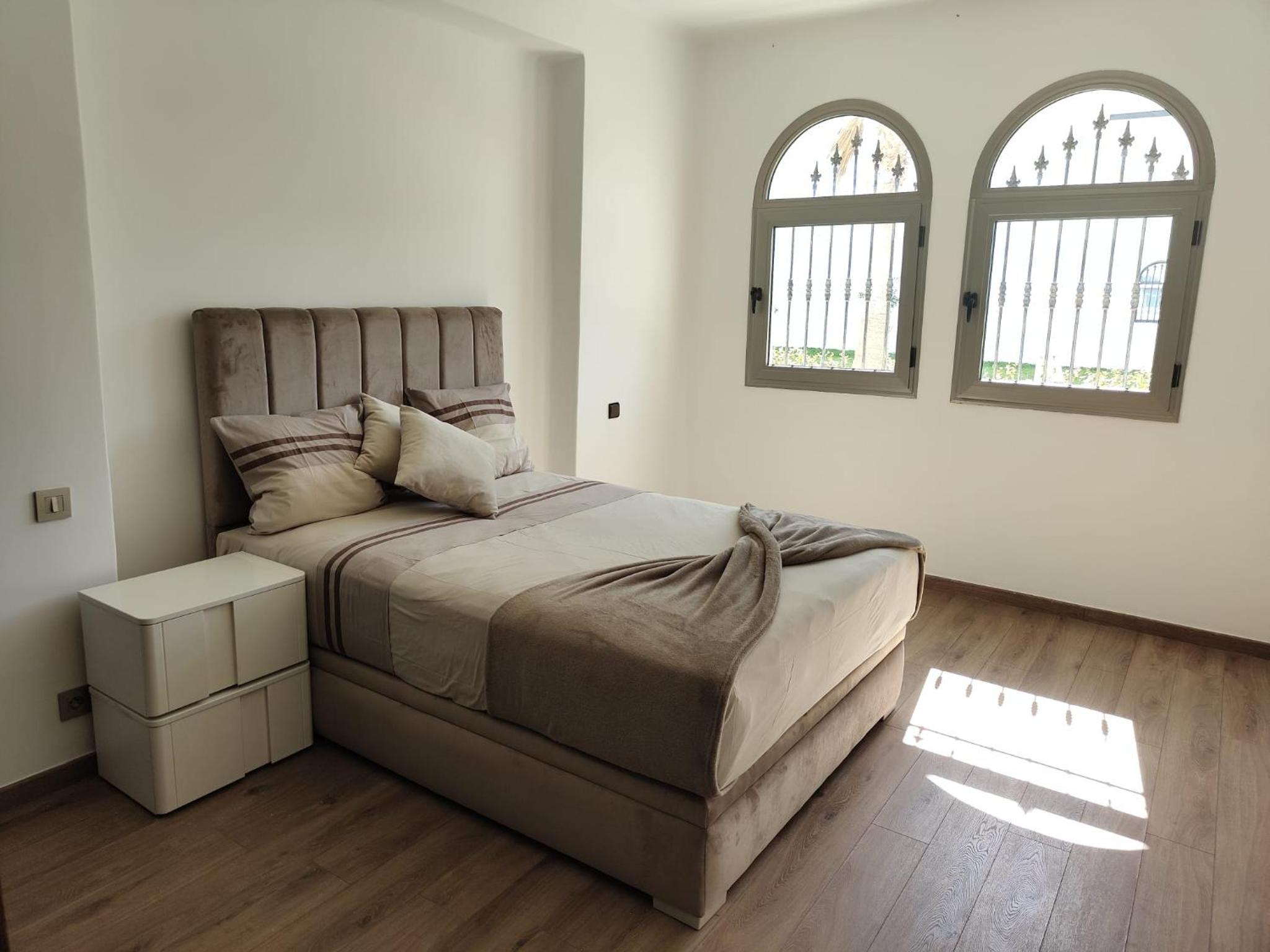 Three-Bedroom House photo 2