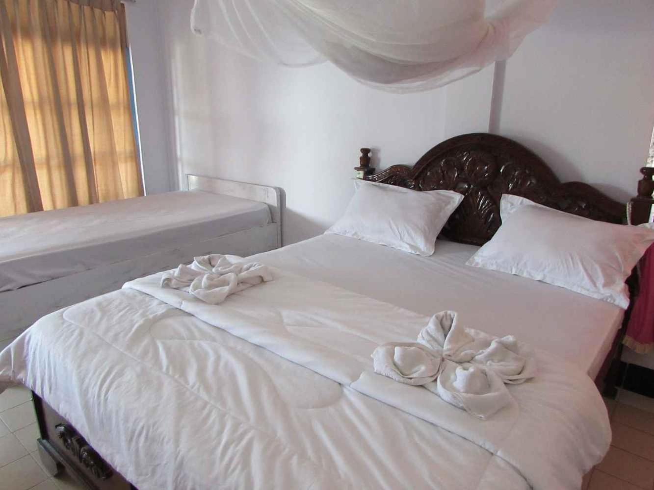 Deluxe Double Room (2 Adults + 1 Child) photo 2