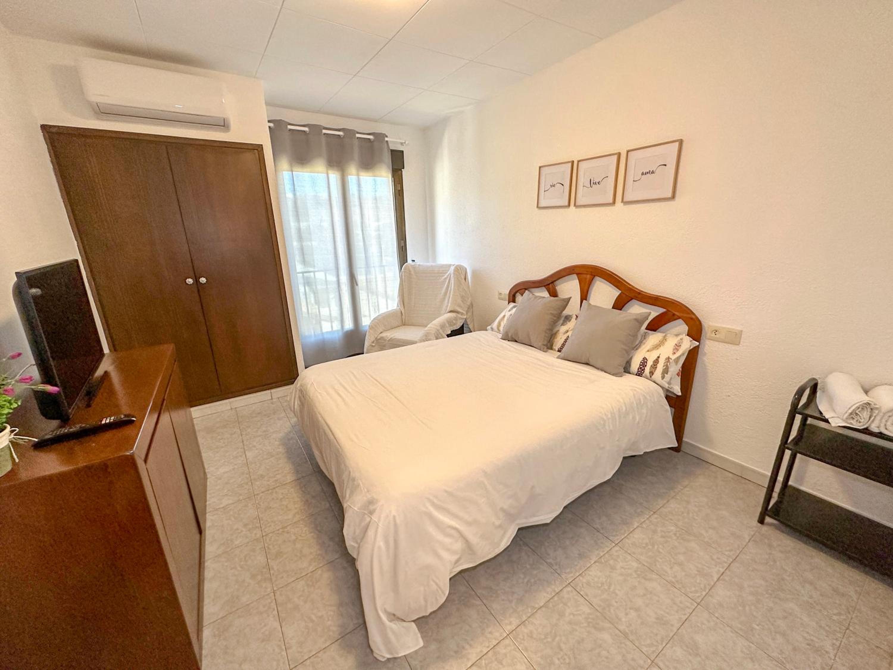 Apartamento con vista a la piscina