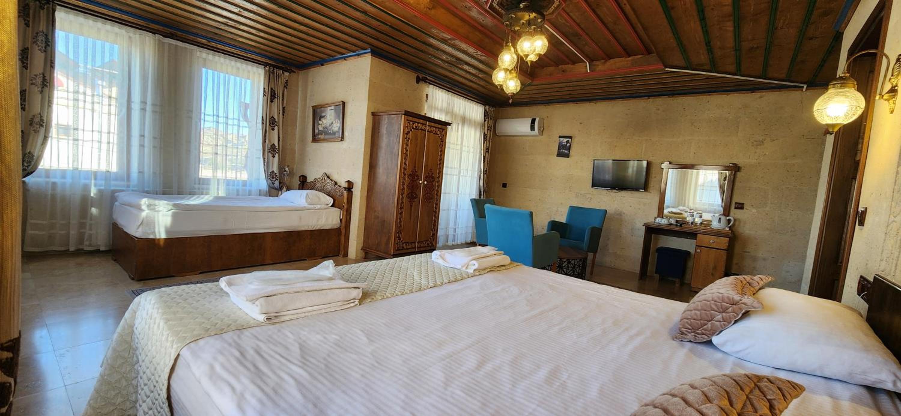 Deluxe Triple Room - Photo 11