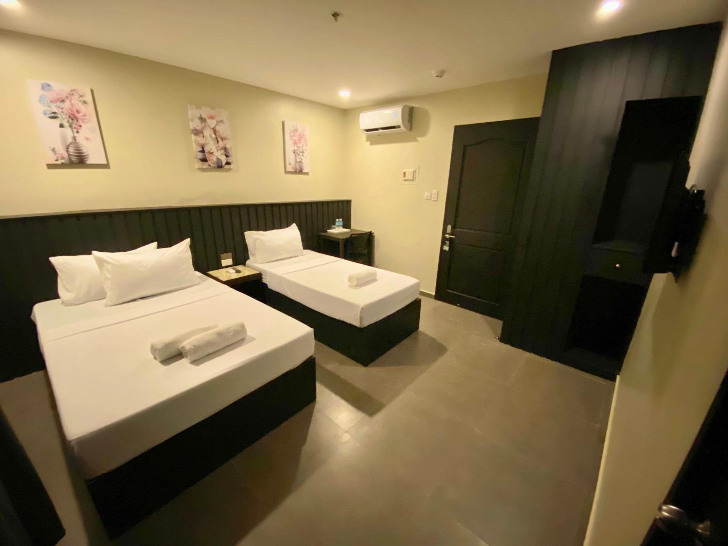 Deluxe Triple Room