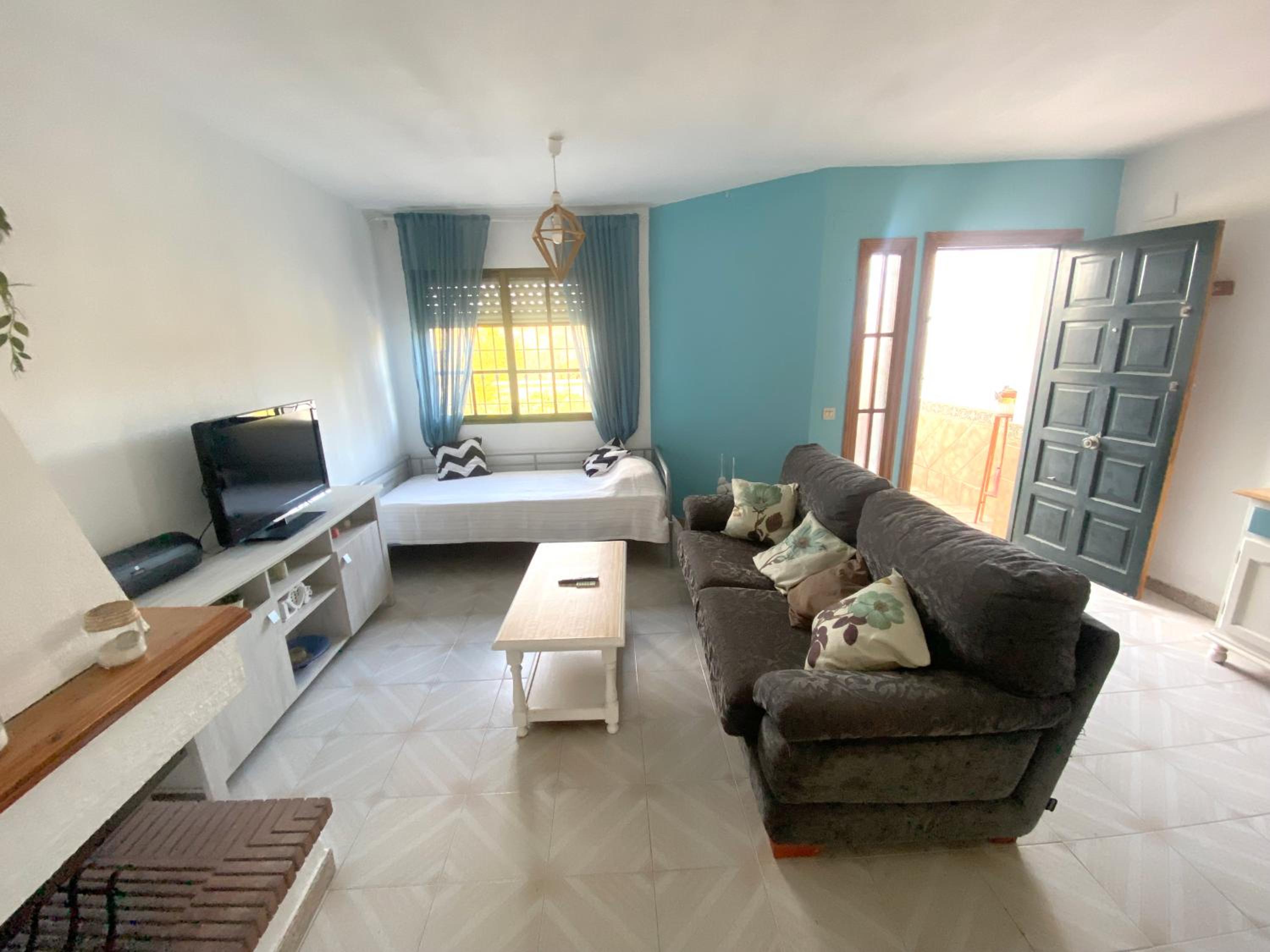 Casa de cuatro habitaciones