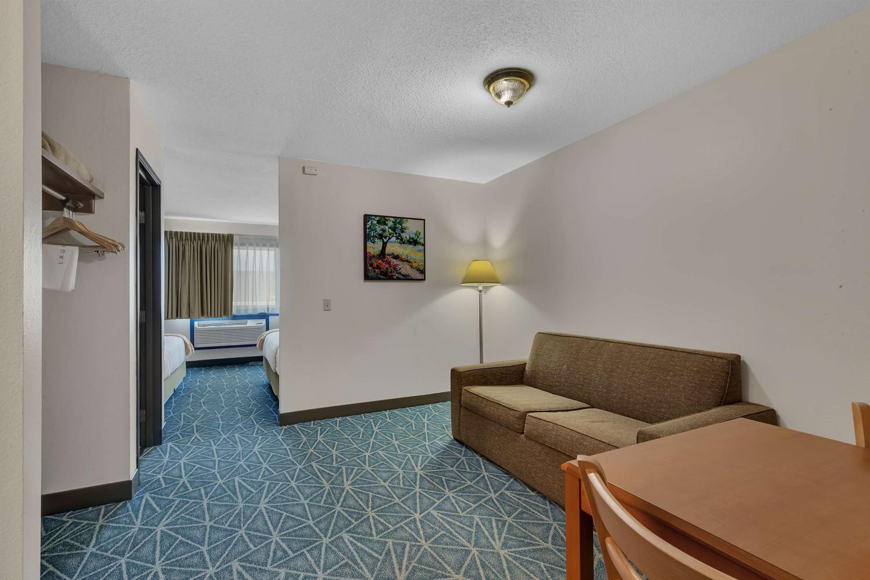 Queen Suite With Two Queen Beds And Sofa Bed