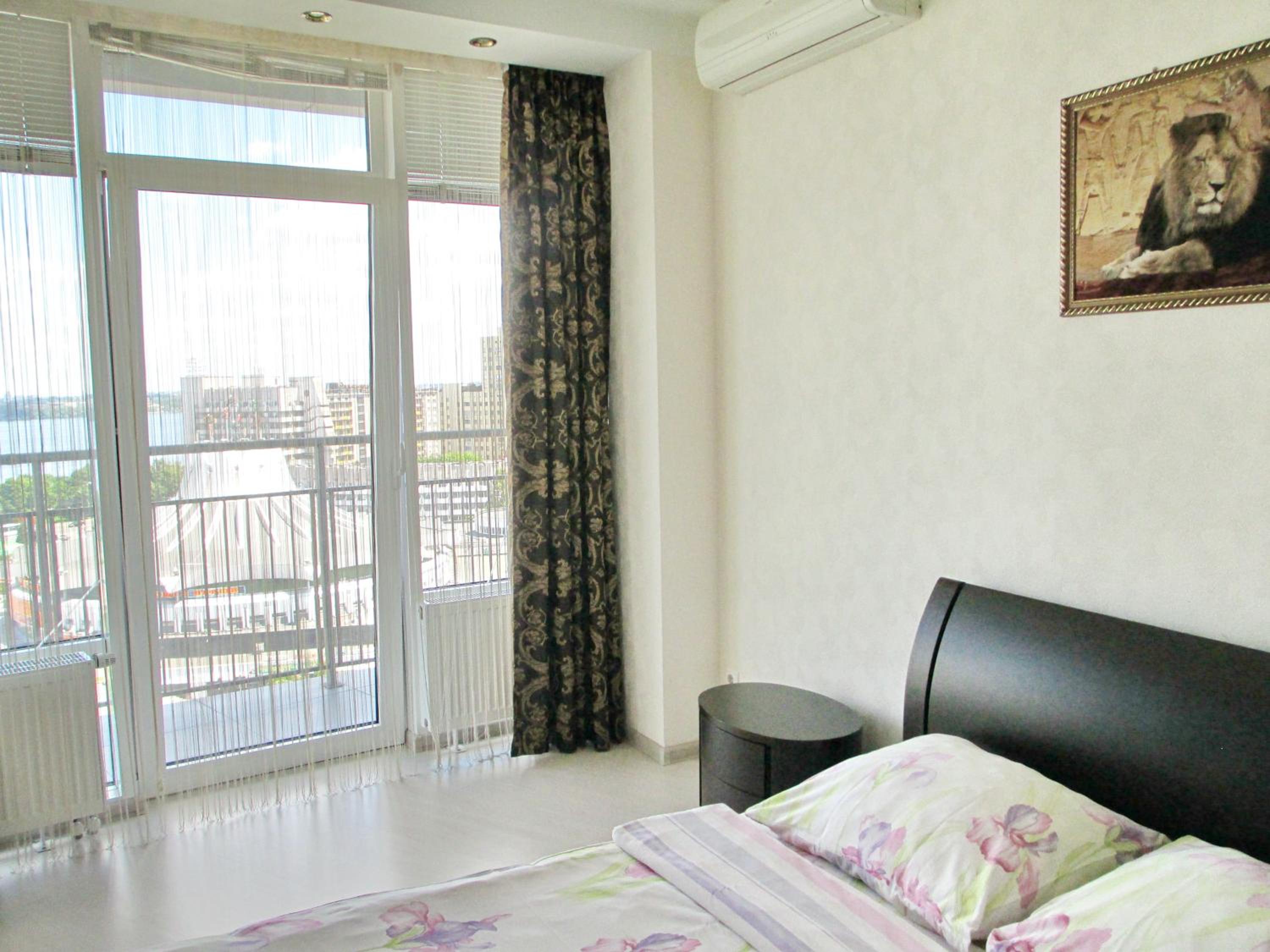 One-Bedroom Apartment with Balcony with the view of the river