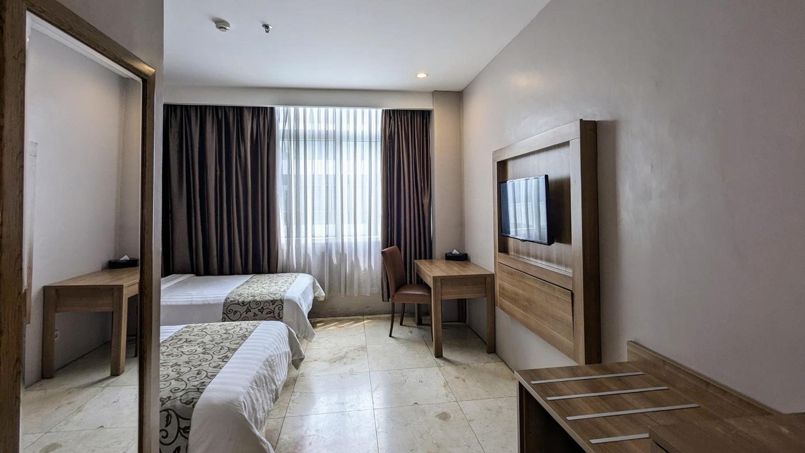 Deluxe Twin Room - Photo 2