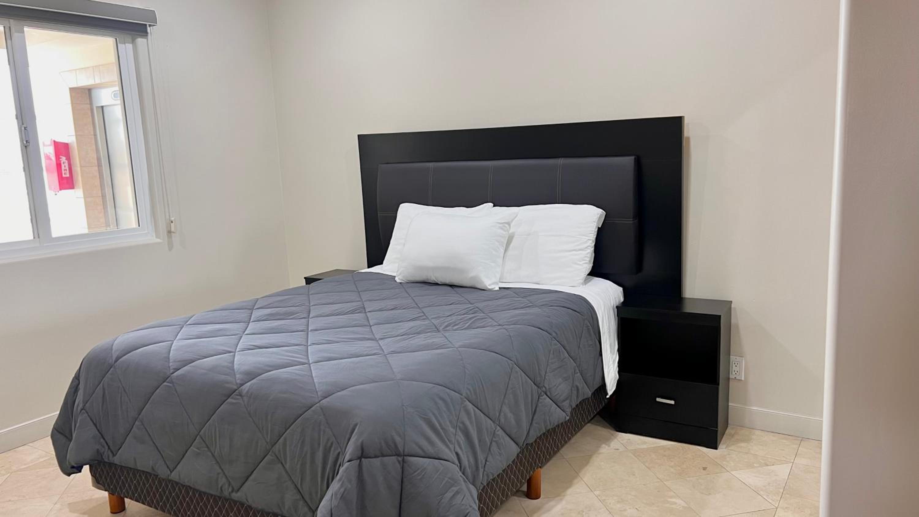 Three-Bedroom Apartment - Photo 33
