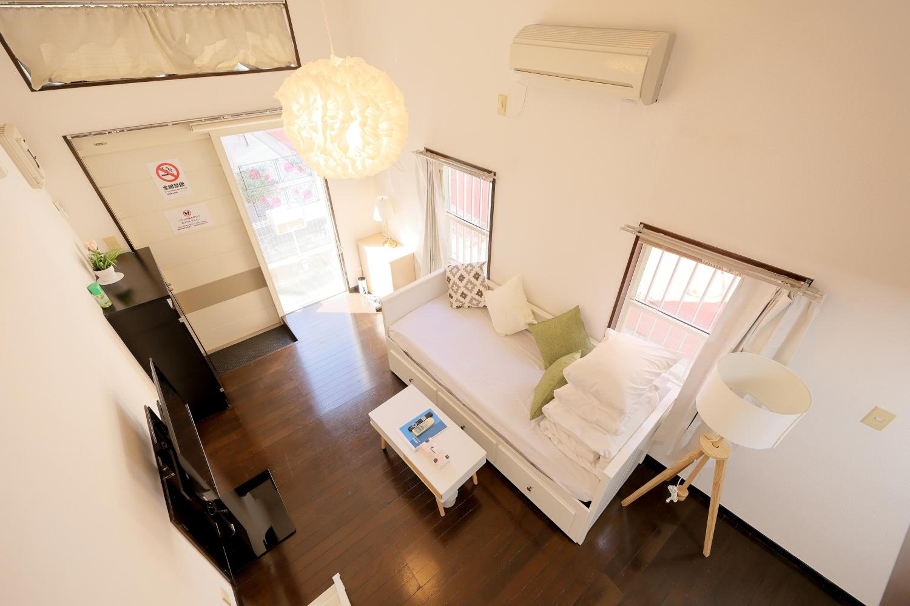 Quadruple Room with Private Bathroom photo 3