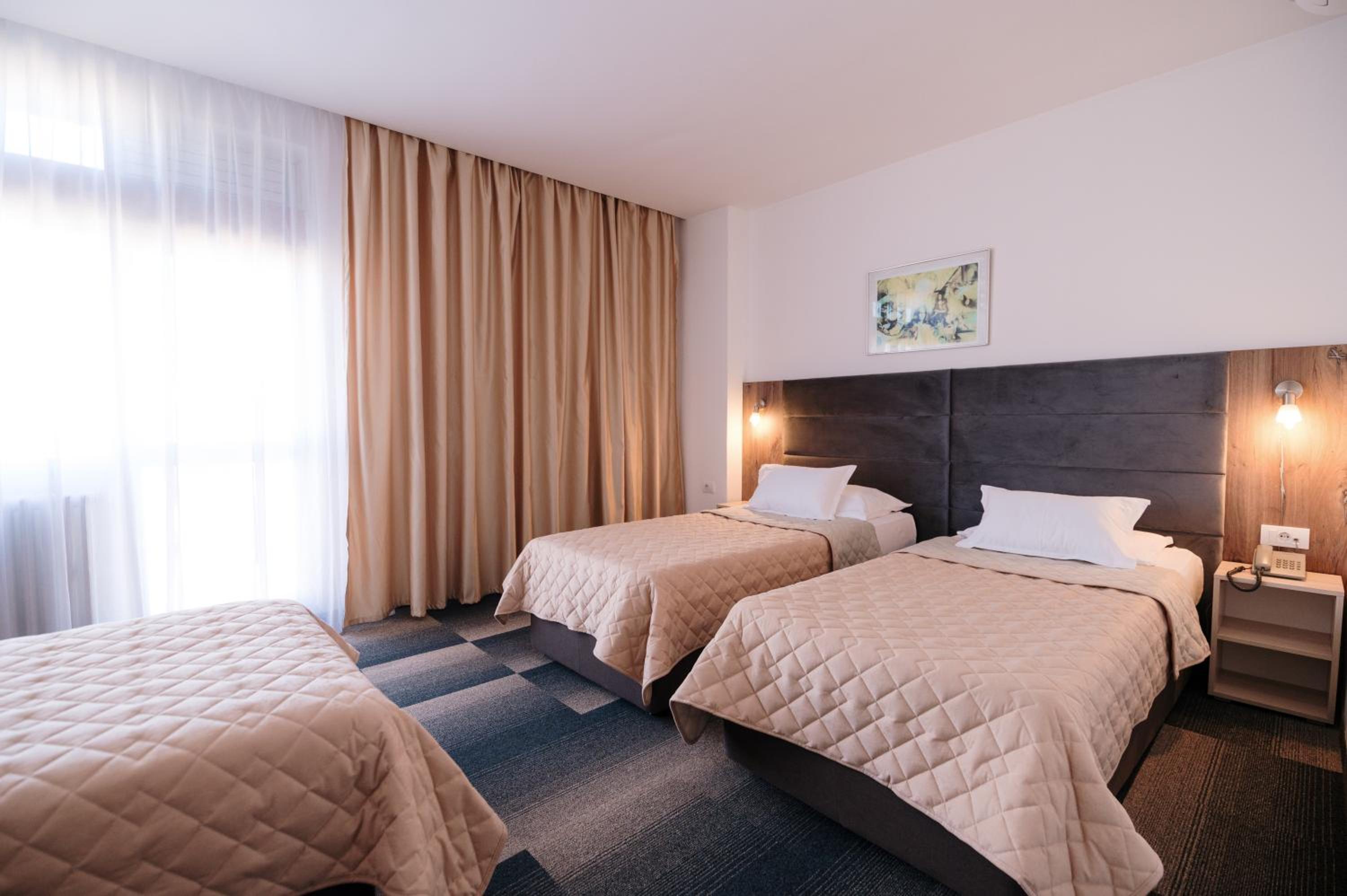 Triple Room - Photo 1