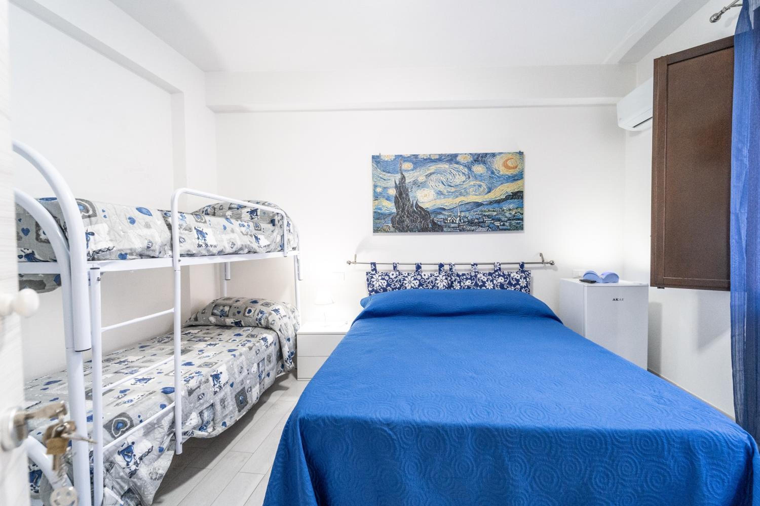 Quadruple Room with Balcony