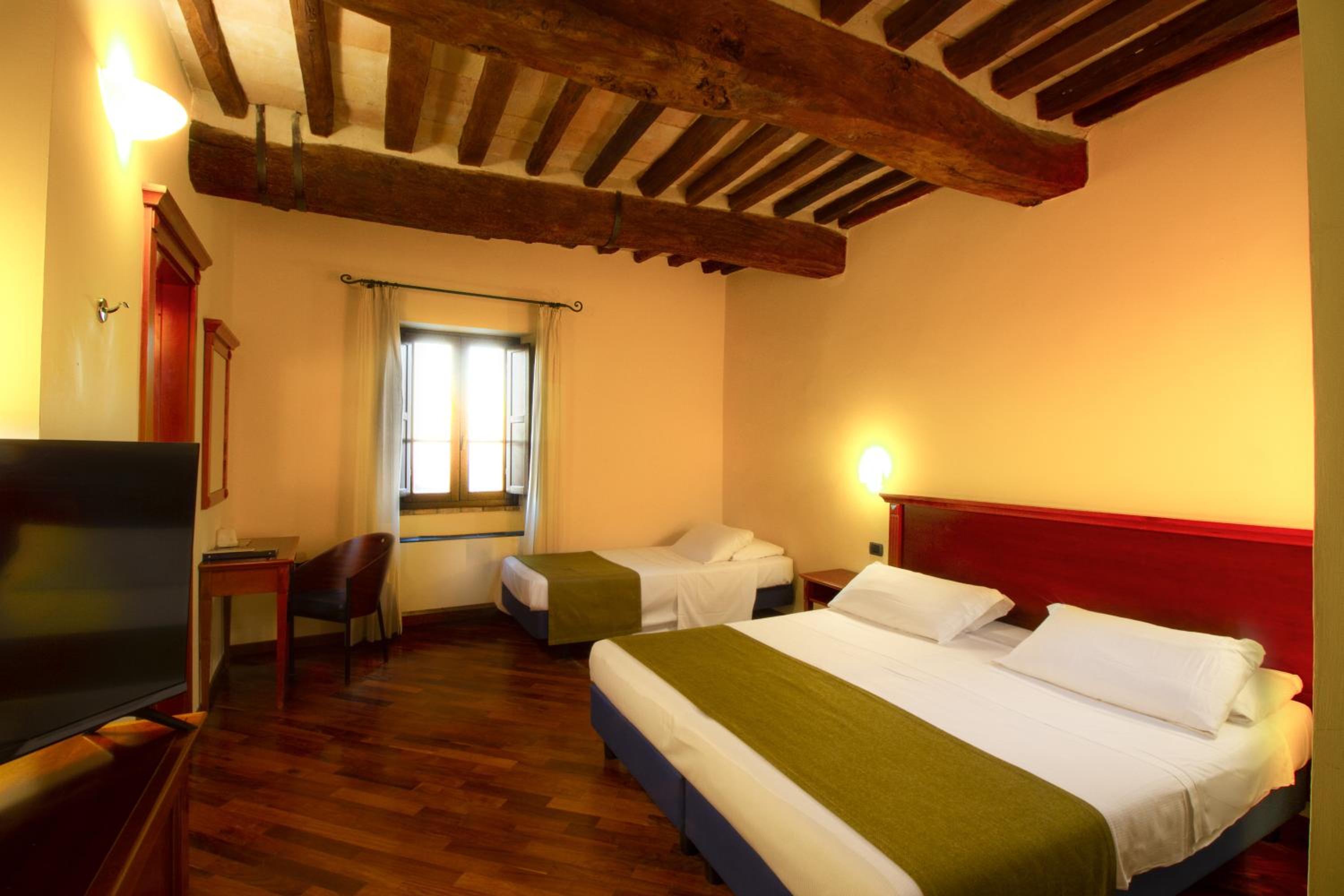 Deluxe Triple Room - Photo 1
