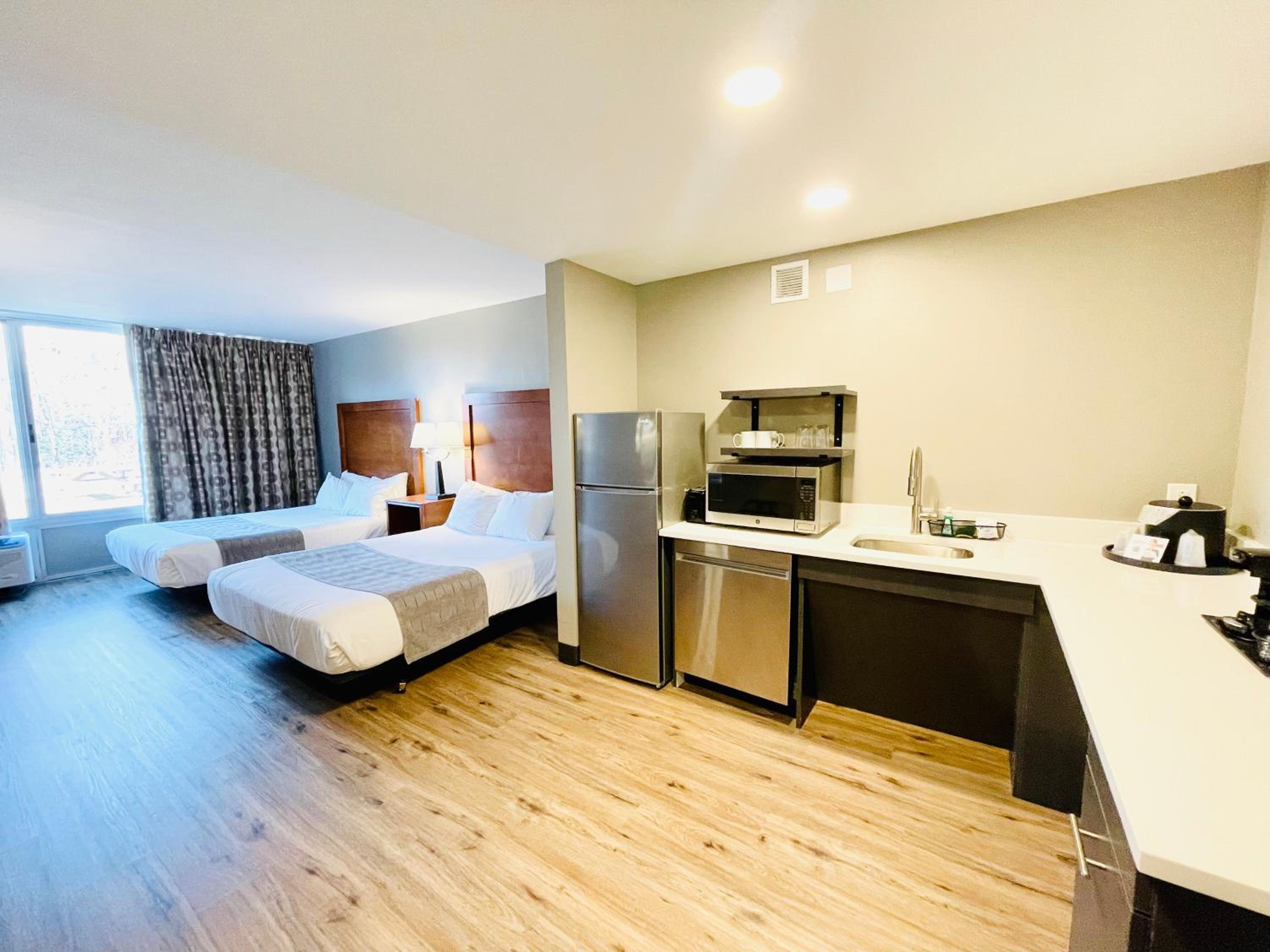 Queen Room with Two Queen Beds and Roll-In Shower - Disability Access/Non-Smoking - Photo 1