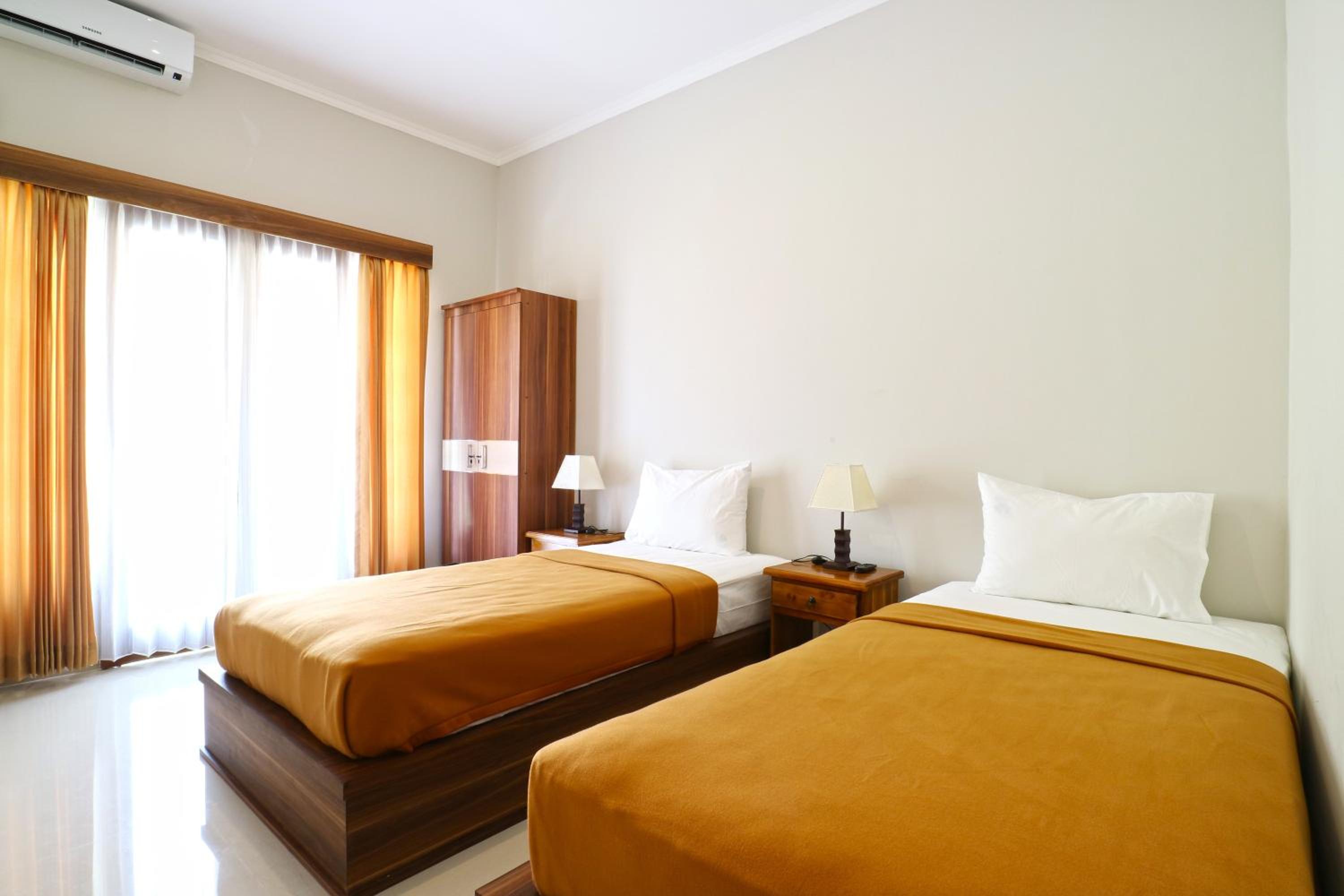 Standard Twin Room - Photo 1