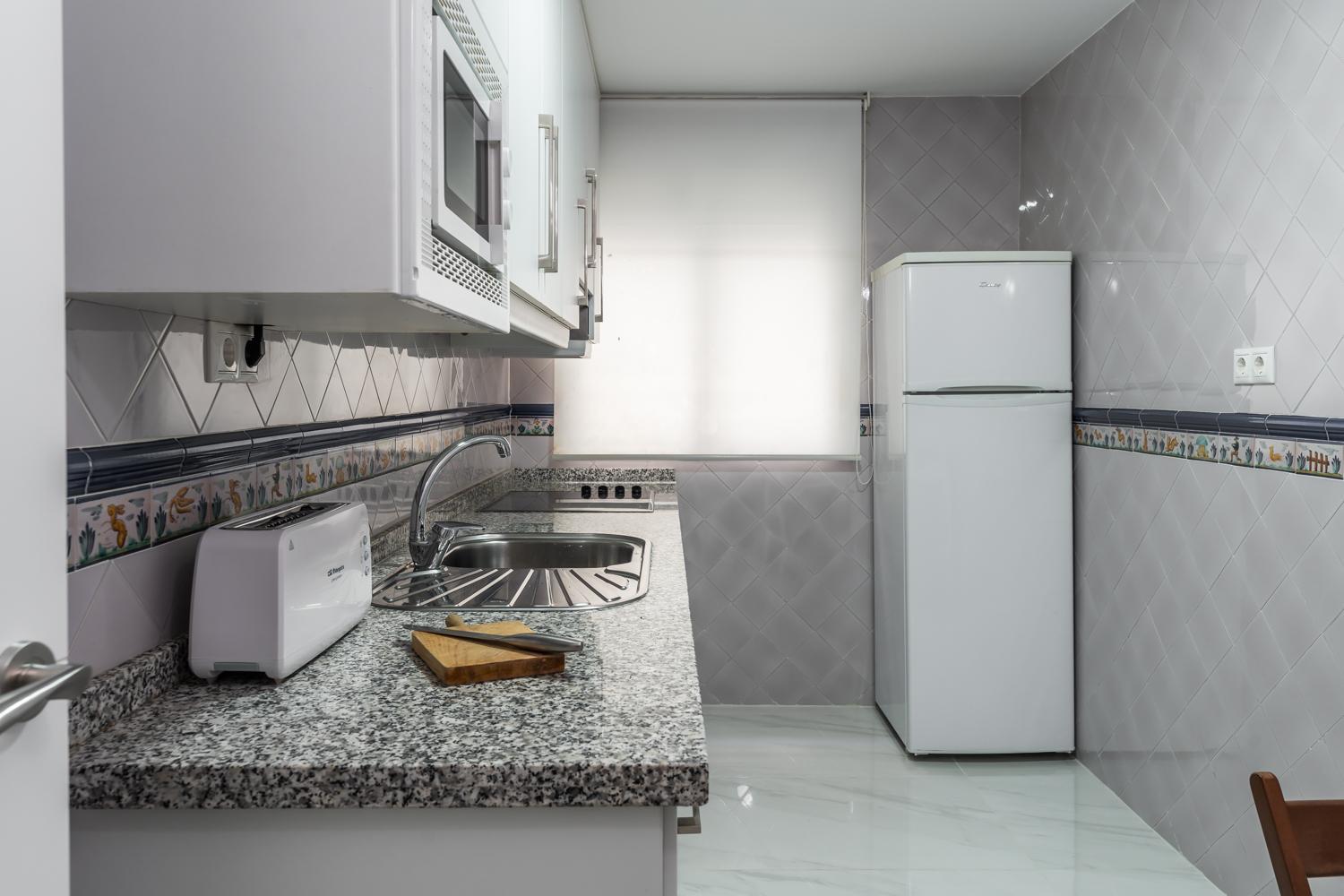 Three-Bedroom Apartment - Photo 43