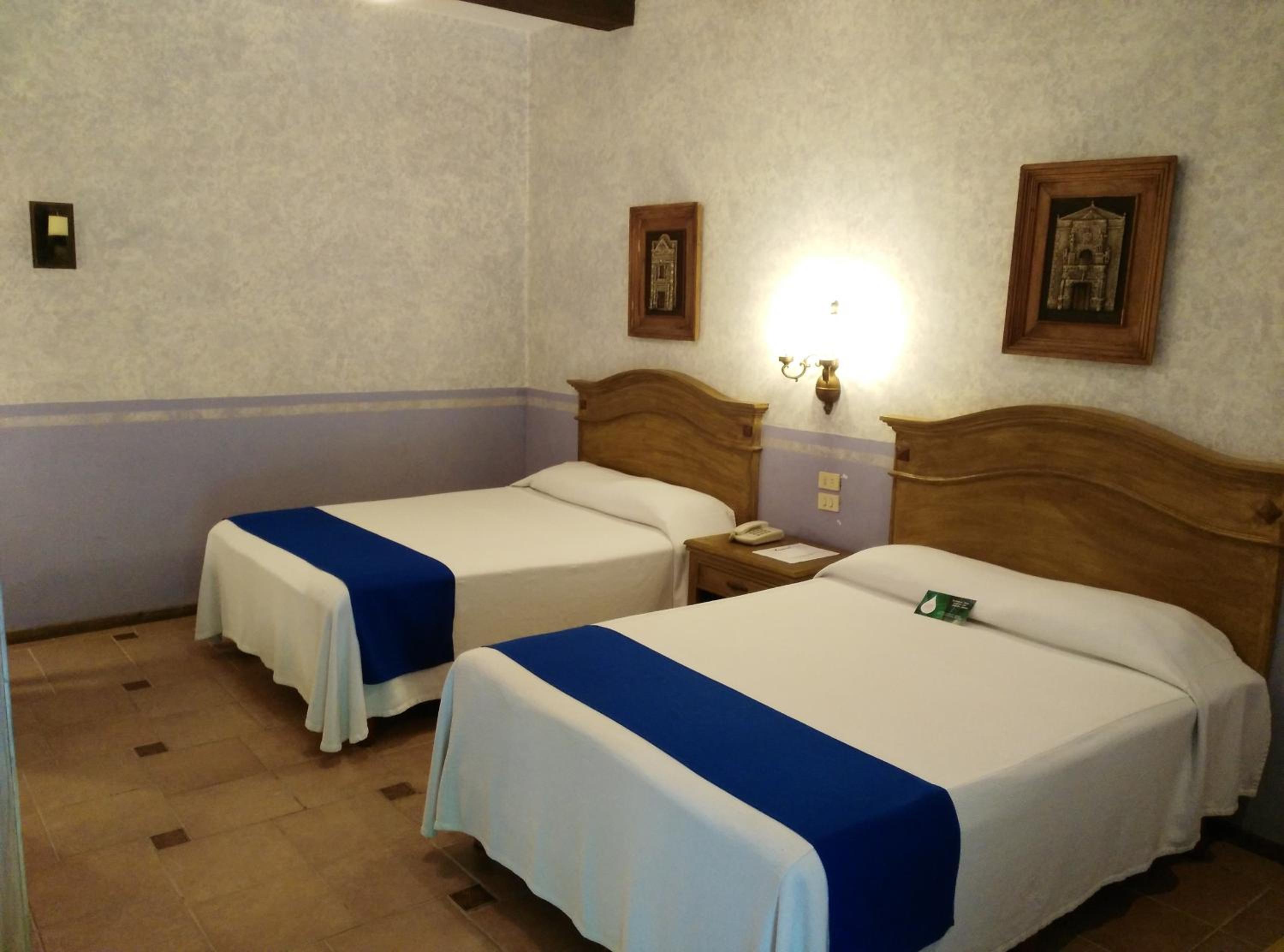 Standard Two Double Beds Room - Photo 6