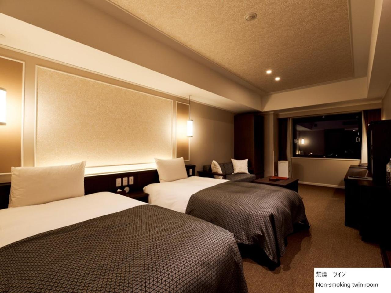 Twin Room - Photo 14