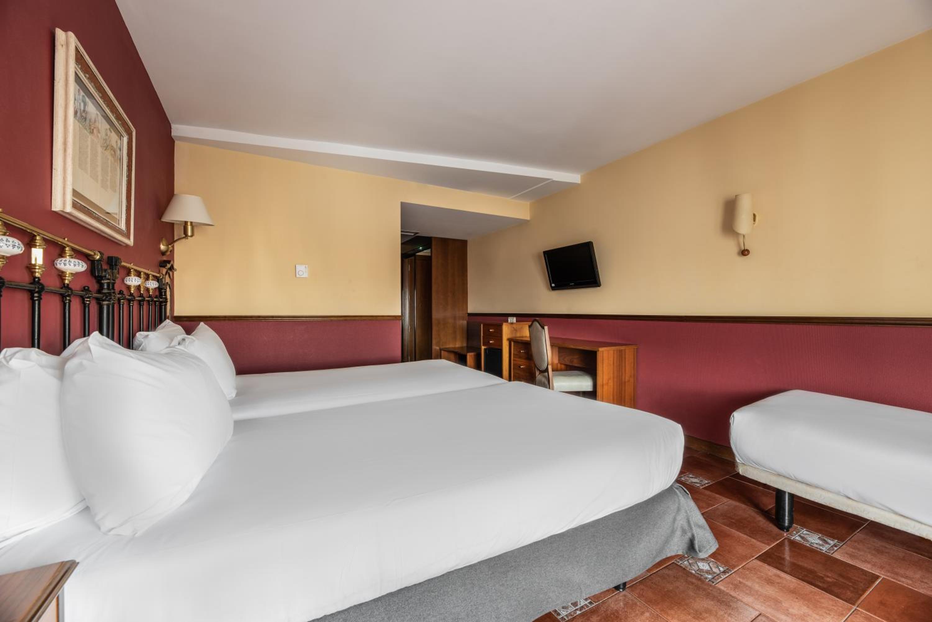 Triple Room - Photo 1