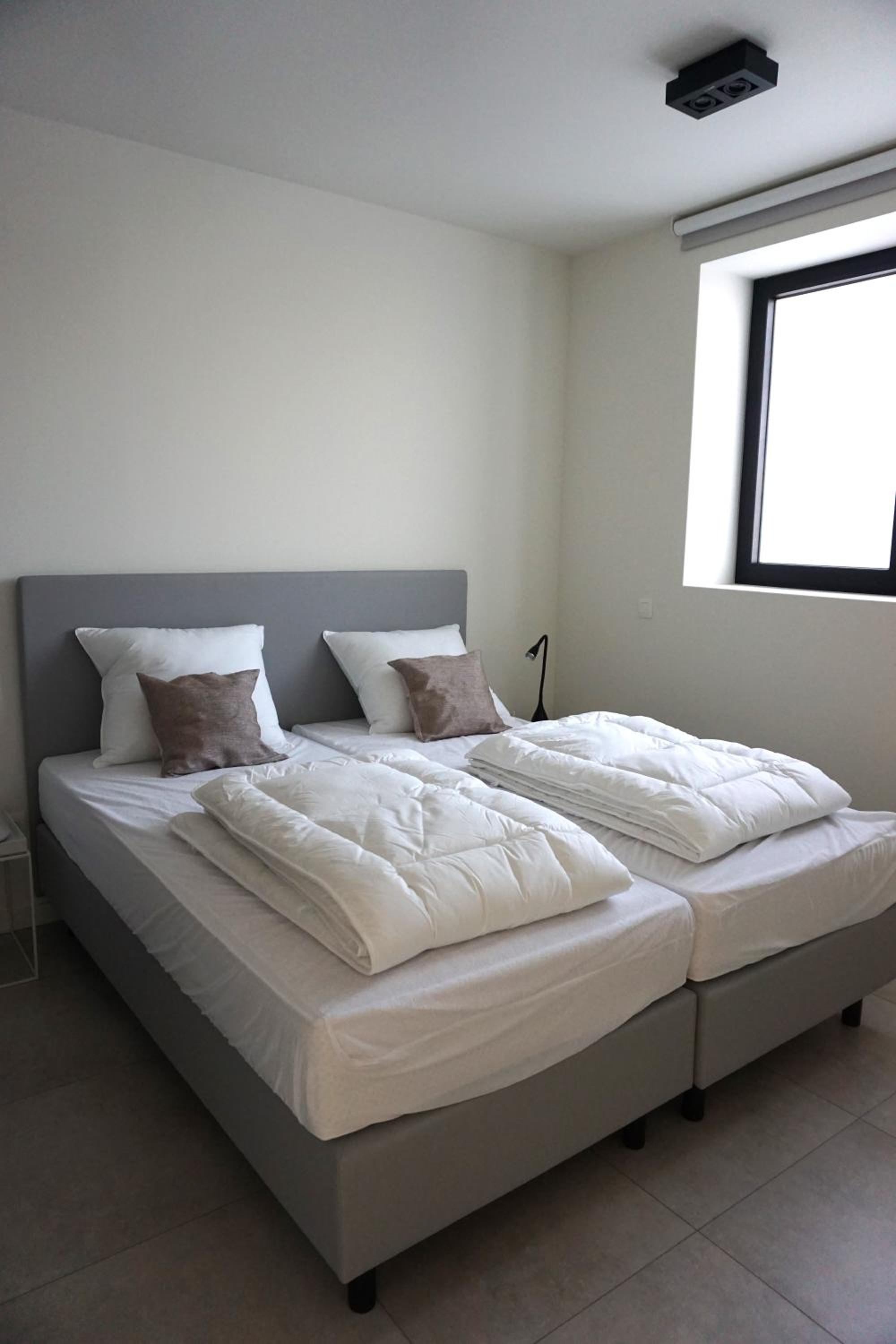 Three-Bedroom Apartment photo 1