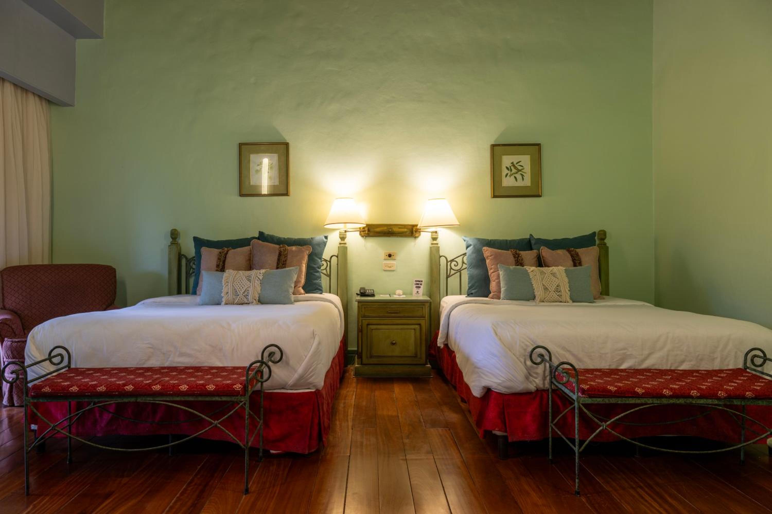 Deluxe Queen Room with Two Queen Beds - Photo 1