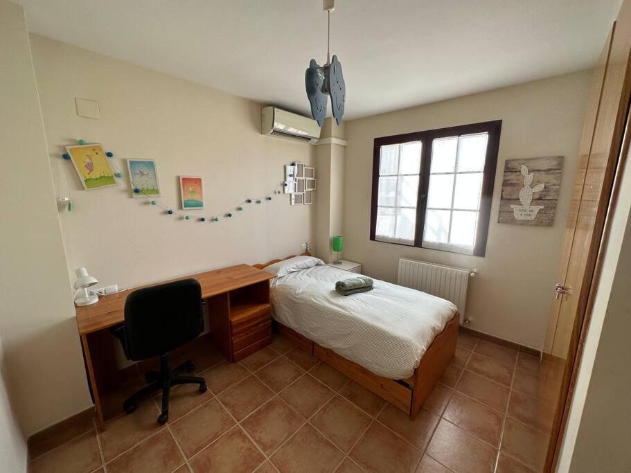 Casa de cuatro habitaciones
