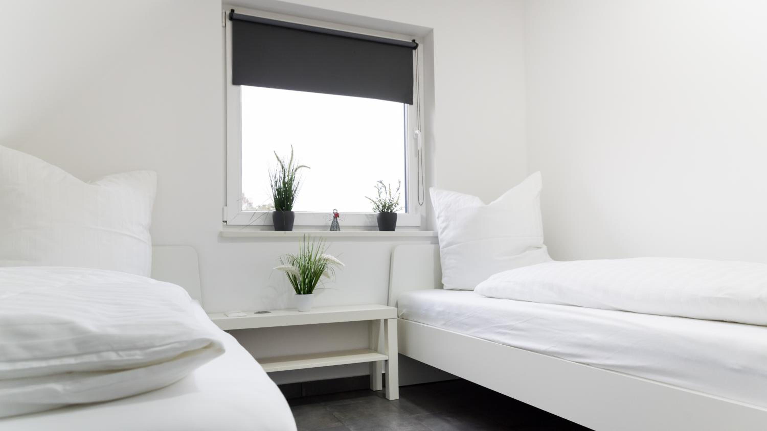 Three-Bedroom Apartment - Photo 10