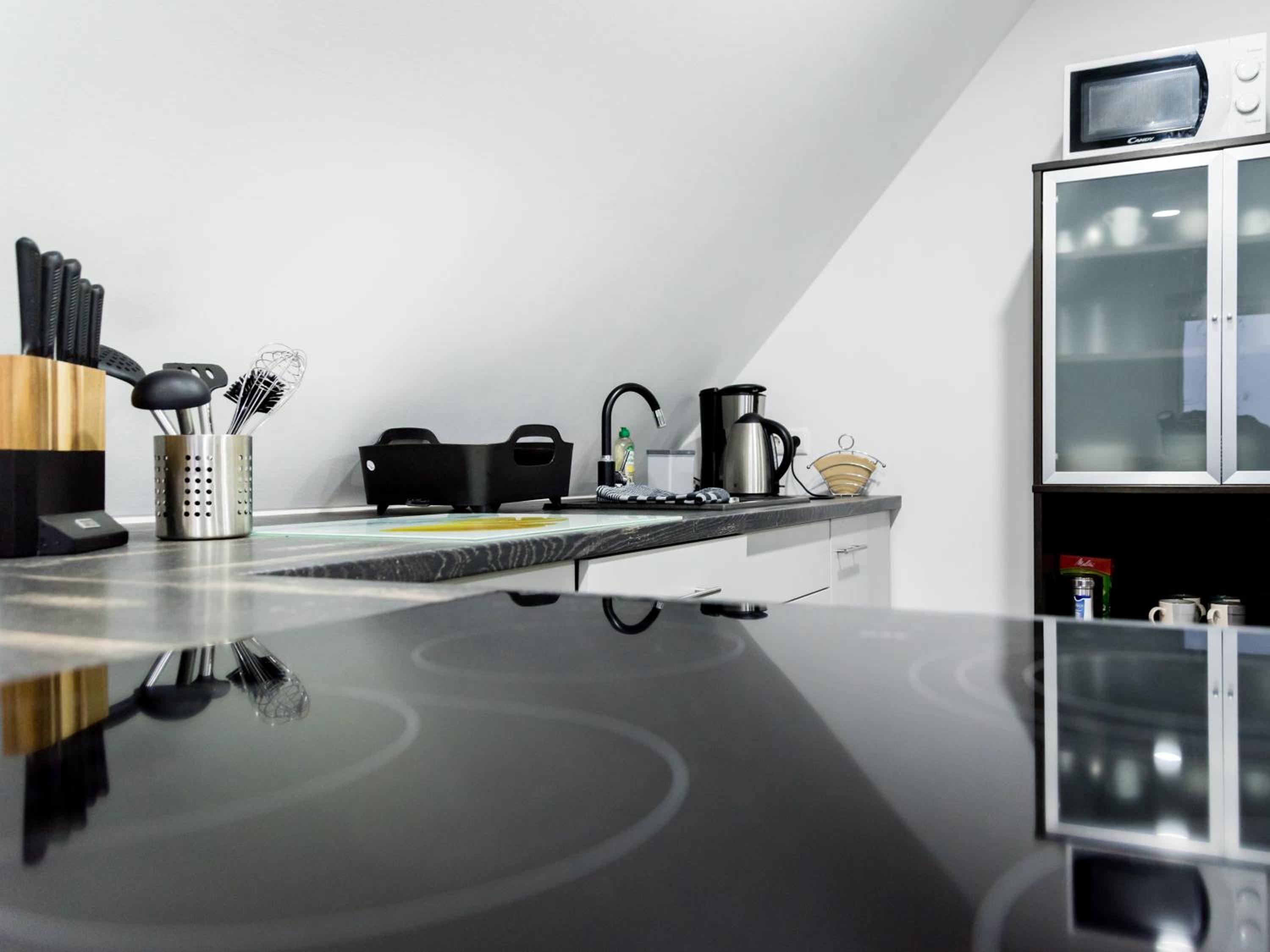 Three-Bedroom Apartment - Photo 18